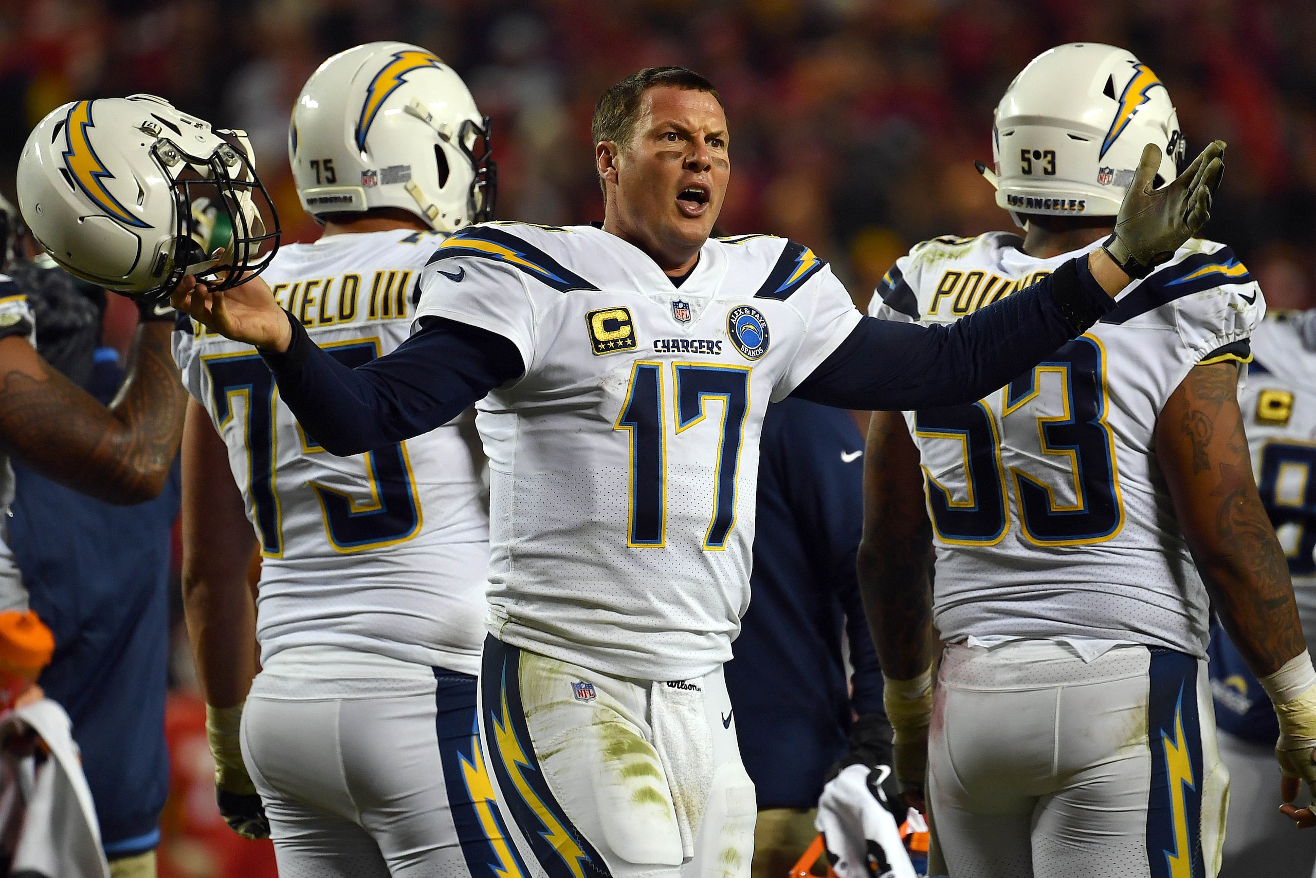 KANSAS CITY, MISSOURI - DECEMBER 13:  Quarterback Philip Rivers #17 of the Los Angeles Chargers protests a non-call after being hit in the helmet during the game against the Kansas City Chiefs at Arrowhead Stadium on December 13, 2018 in Kansas City, Miss