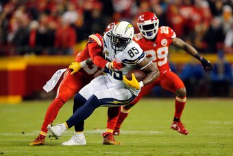 KANSAS CITY, MISSOURI - DECEMBER 13:  Tight end Antonio Gates #85 of the Los Angeles Chargers is tackled after making a catch during the game against the Kansas City Chiefs at Arrowhead Stadium on December 13, 2018 in Kansas City, Missouri. (Photo by Davi