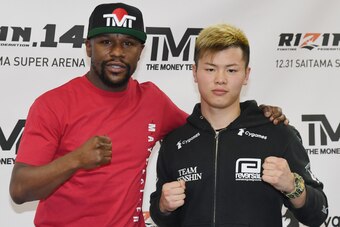 LAS VEGAS, NEVADA - DECEMBER 06:  Floyd Mayweather Jr. (L) and Tenshin Nasukawa pose during a news conference at the Mayweather Boxing Club on December 6, 2018 in Las Vegas, Nevada. The two will meet in a three-round boxing exhibition at Saitama Prefectur
