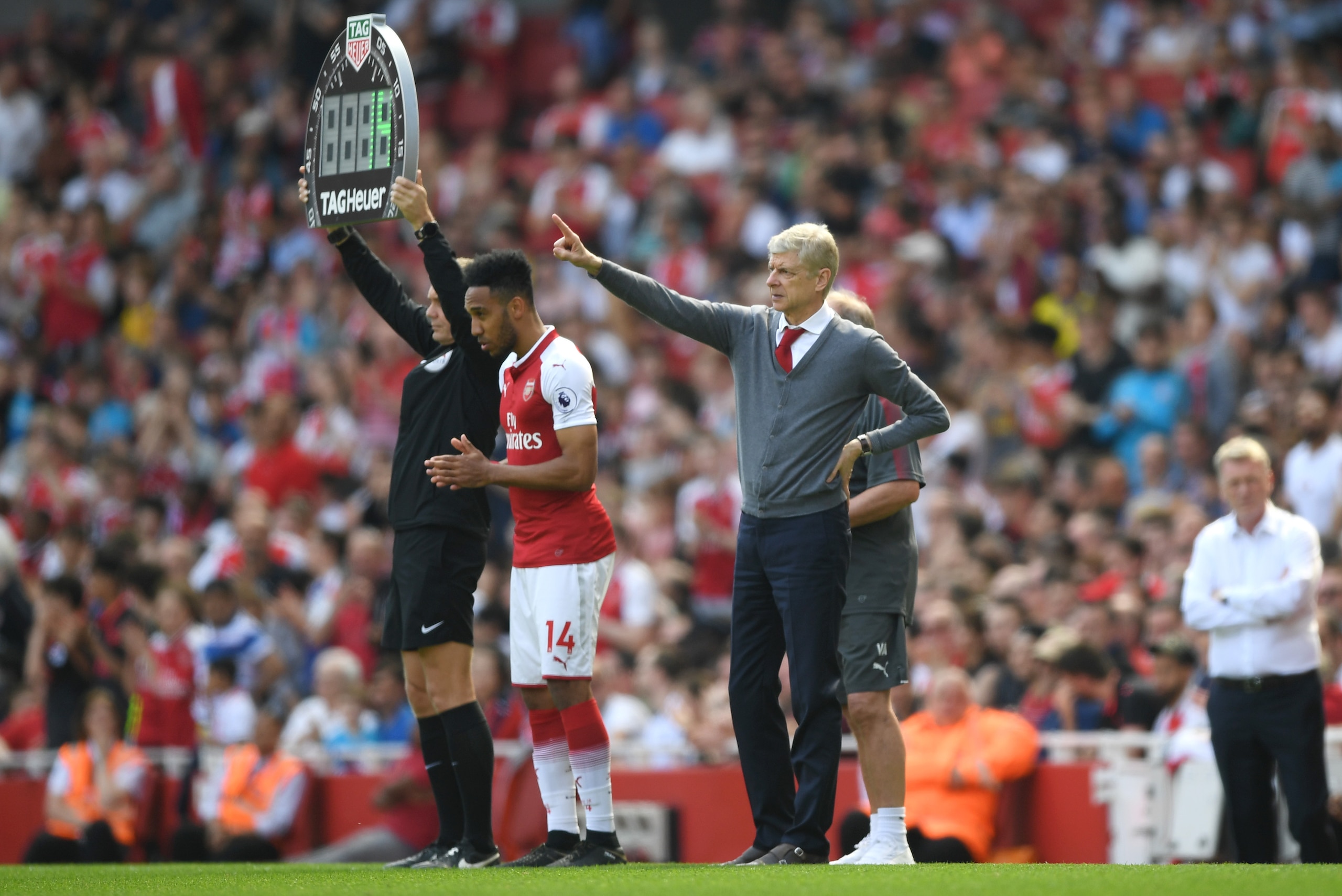 LONDON, ENGLAND - APRIL 22:  Arsene Wenger, Manager of Arsenal gestures as Pierre-Emerick Aubameyang of Arsenal comes on during the Premier League match between Arsenal and West Ham United at Emirates Stadium on April 22, 2018 in London, England.  (Photo 