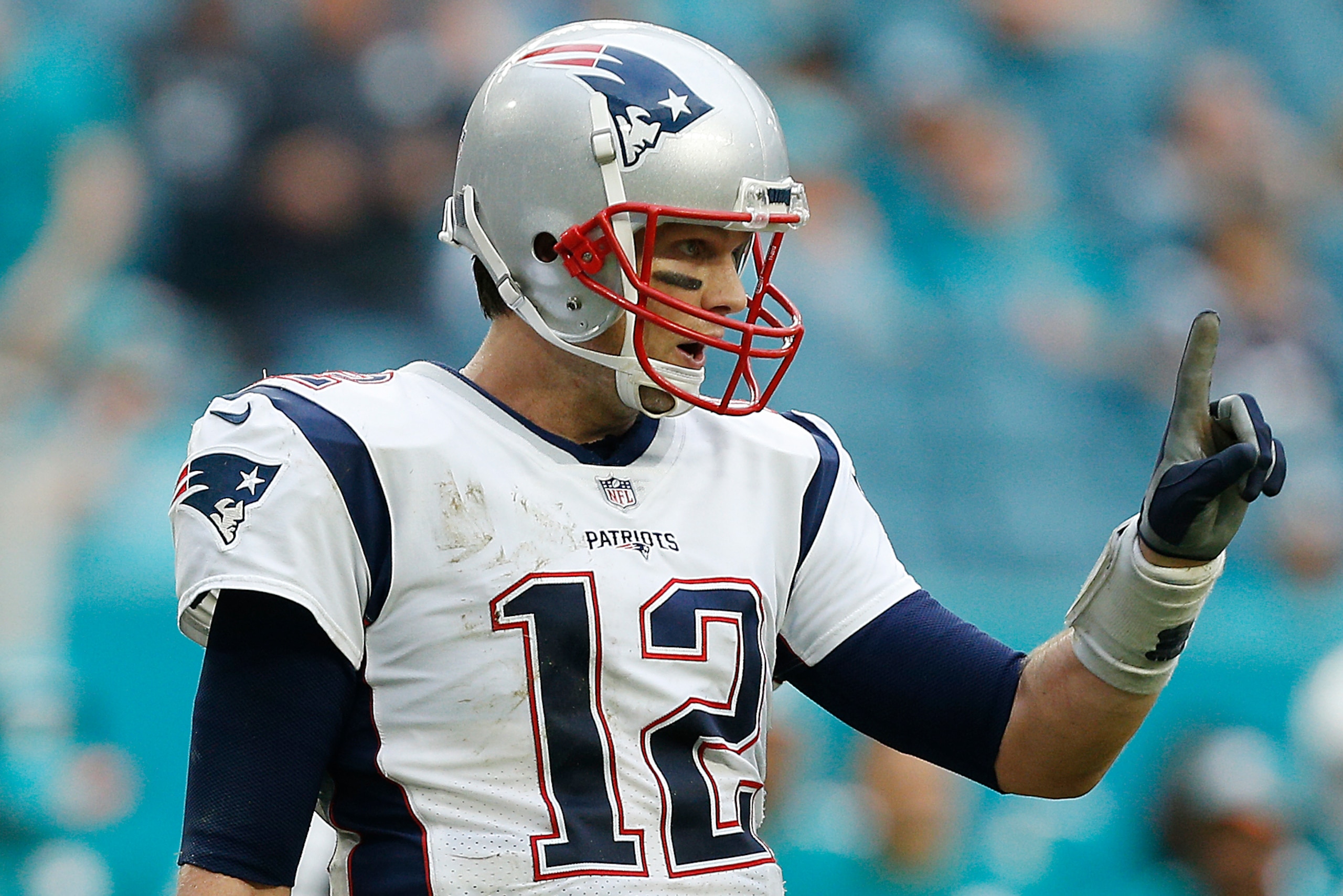 MIAMI, FL - DECEMBER 09:  Tom Brady #12 of the New England Patriots reacts against the Miami Dolphins at Hard Rock Stadium on December 9, 2018 in Miami, Florida.  (Photo by Michael Reaves/Getty Images)