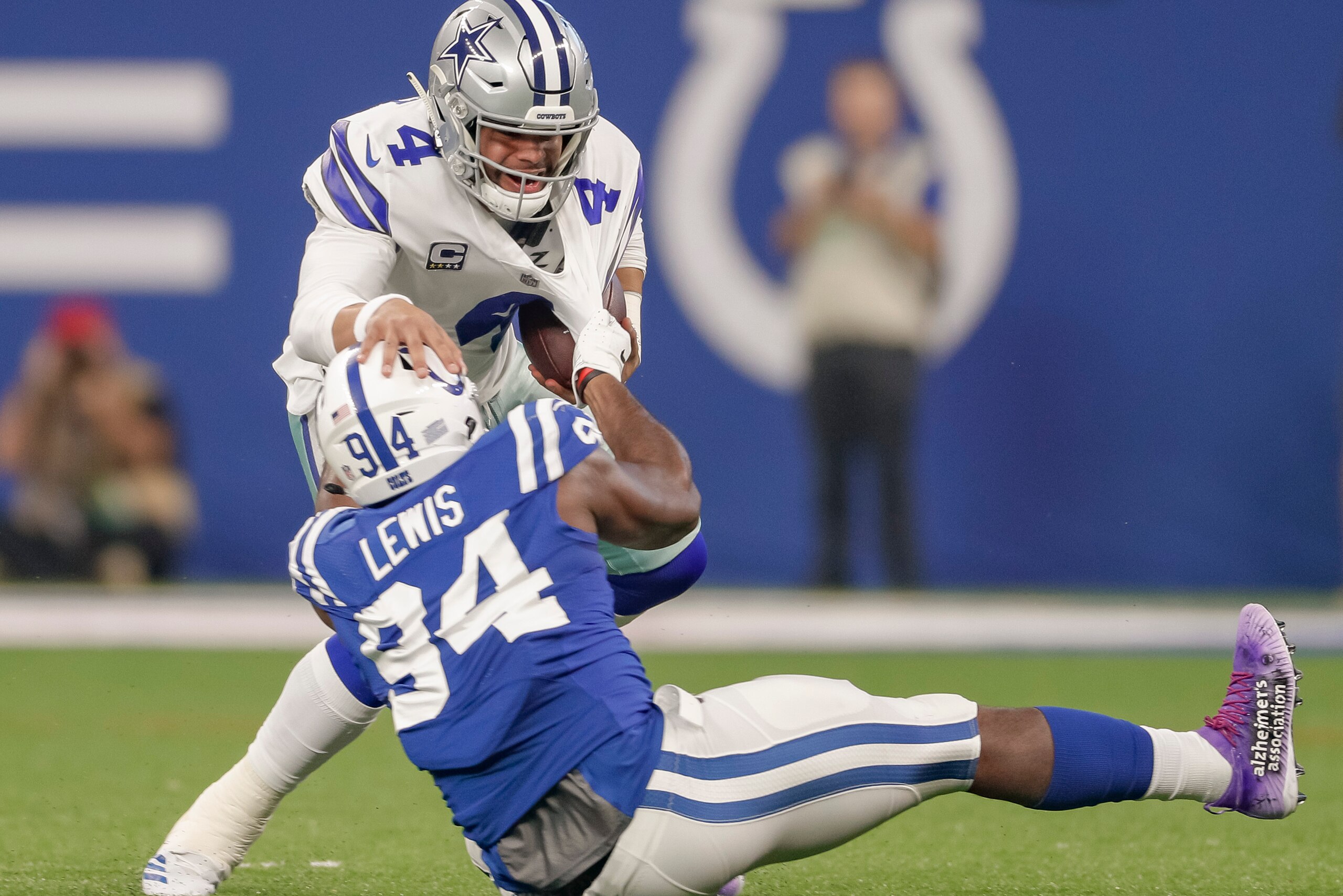 INDIANAPOLIS, IN - DECEMBER 16: Dak Prescott #4 of the Dallas Cowboys is sacked by Tyquan Lewis #94 of the Indianapolis Colts during the game at Lucas Oil Stadium on December 16, 2018 in Indianapolis, Indiana. (Photo by Michael Hickey/Getty Images)