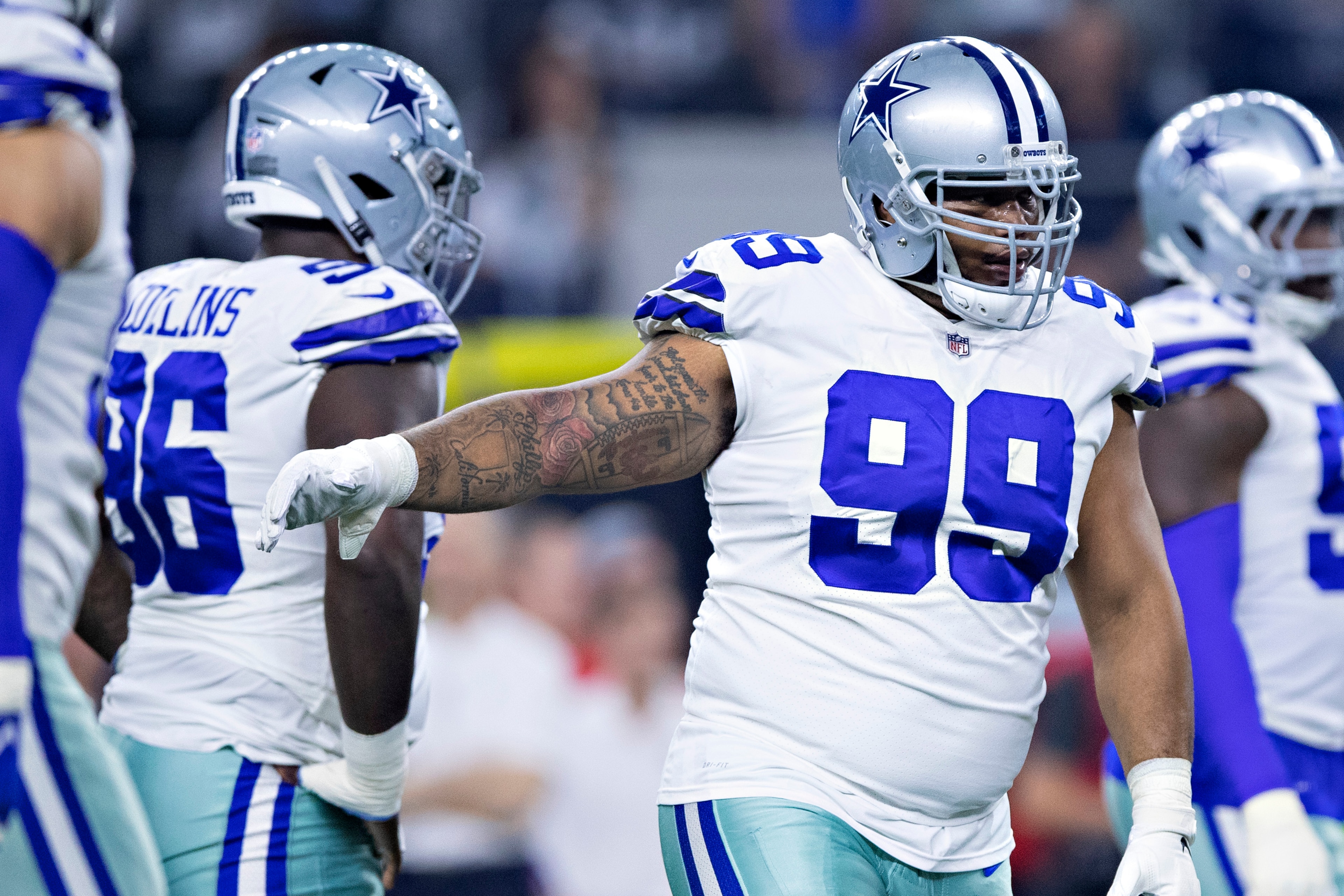 ARLINGTON, TX - NOVEMBER 22:  Antwaun Woods #99 of the Dallas Cowboys looks over the offense during a game against the Washington Redskins at AT&T Stadium on November 22, 2018 in Arlington, Texas.  The Cowboys defeated the Redskins 31-23.  (Photo by Wesle