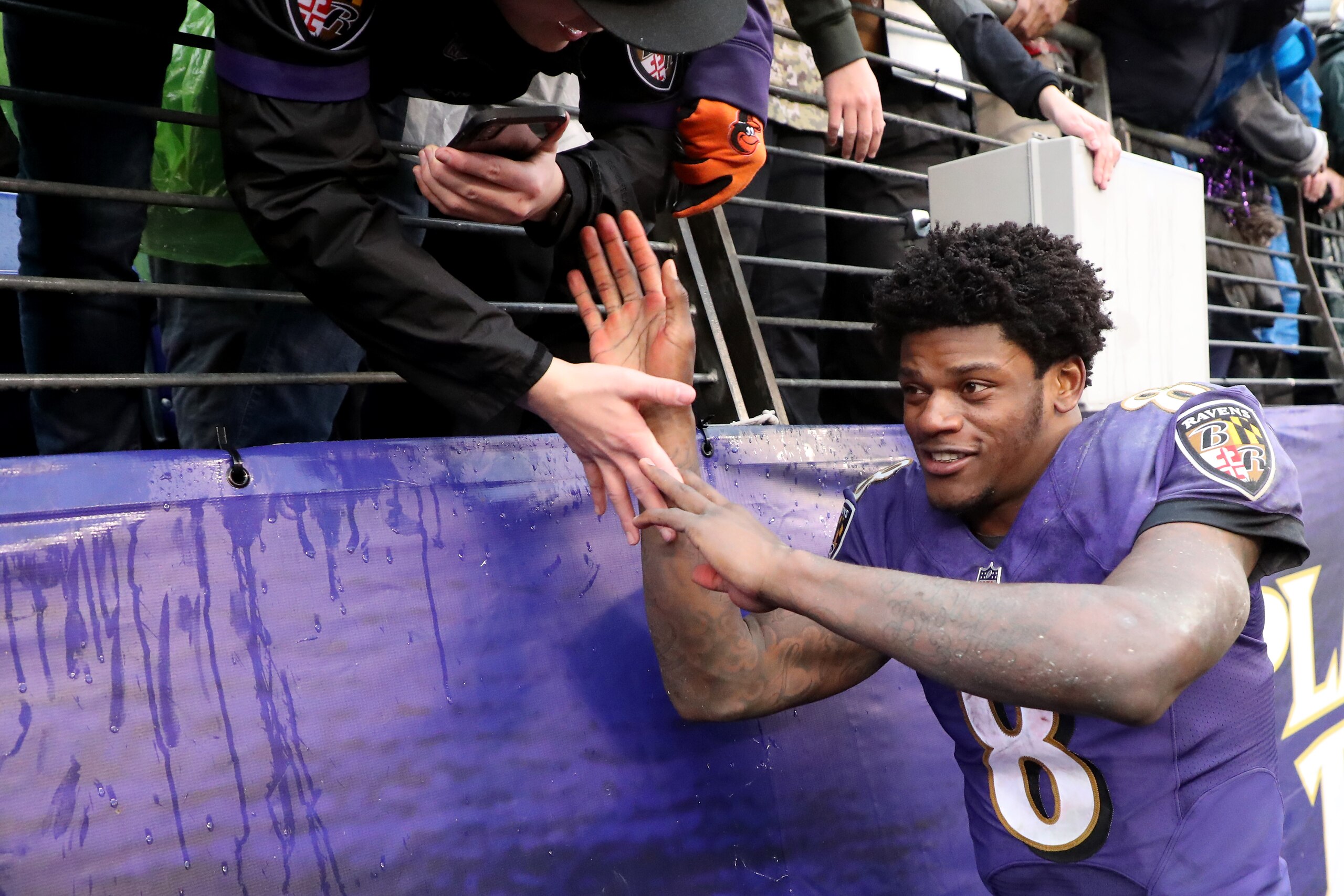 BALTIMORE, MARYLAND - DECEMBER 16: Lamar Jackson #8 of the Baltimore Ravens celebrates with fans following the Ravens 20-12 win over the Tampa Bay Buccaneers at M&T Bank Stadium on December 16, 2018 in Baltimore, Maryland. (Photo by Rob Carr/Getty Images) BALTIMORE, MARYLAND - DECEMBER 16: Lamar Jackson #8 of the Baltimore Ravens celebrates with fans following the Ravens 20-12 win over the Tampa Bay Buccaneers at M&T Bank Stadium on December 16, 2018 in Baltimore, Maryland. (Photo by Rob Carr/Getty Images)