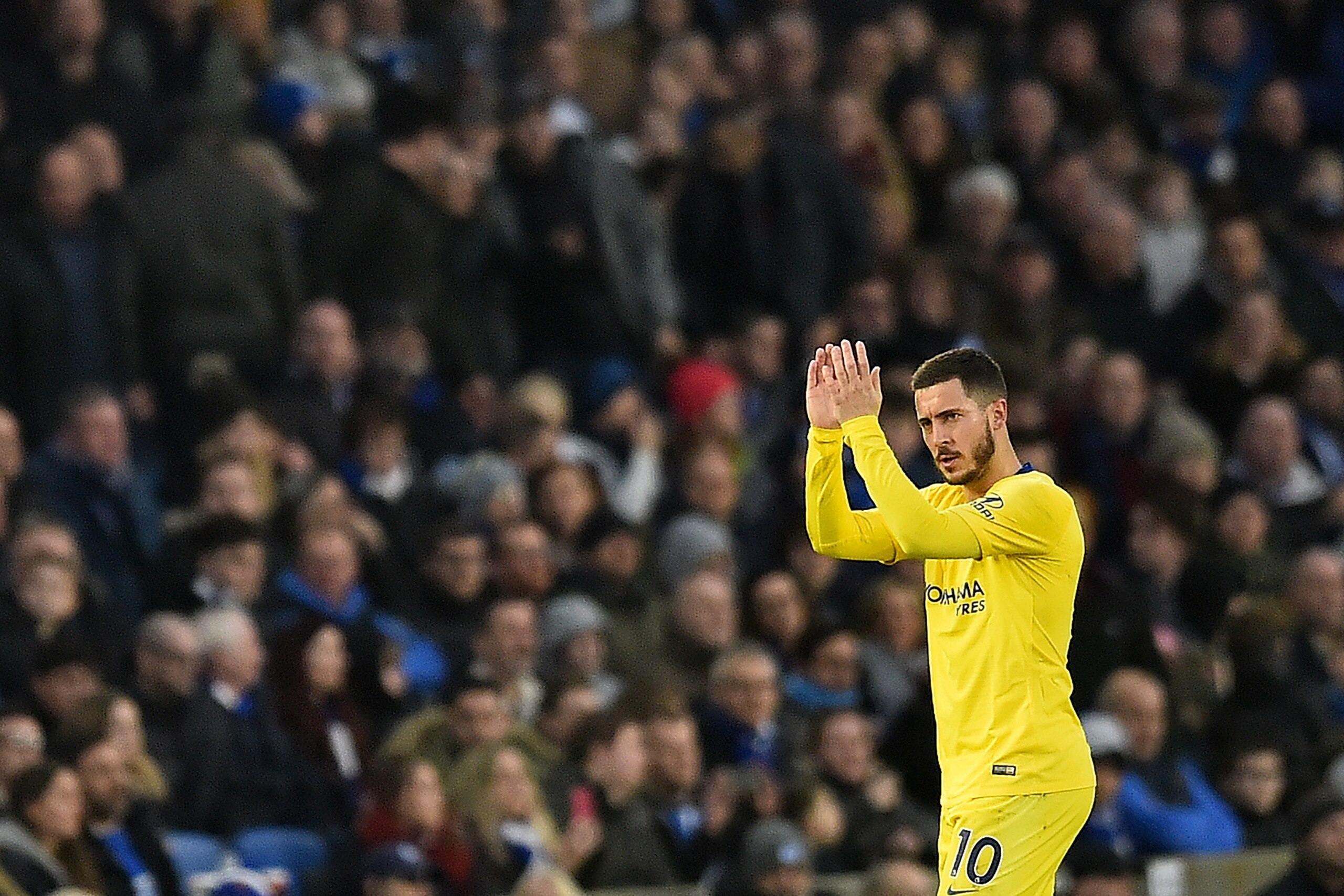 Chelsea's Belgian midfielder Eden Hazard applauds the fans as he leaves the pitch after being substituted off during the English Premier League football match between Brighton and Hove Albion and Chelsea at the American Express Community Stadium in Bright Chelsea's Belgian midfielder Eden Hazard applauds the fans as he leaves the pitch after being substituted off during the English Premier League football match between Brighton and Hove Albion and Chelsea at the American Express Community Stadium in Bright