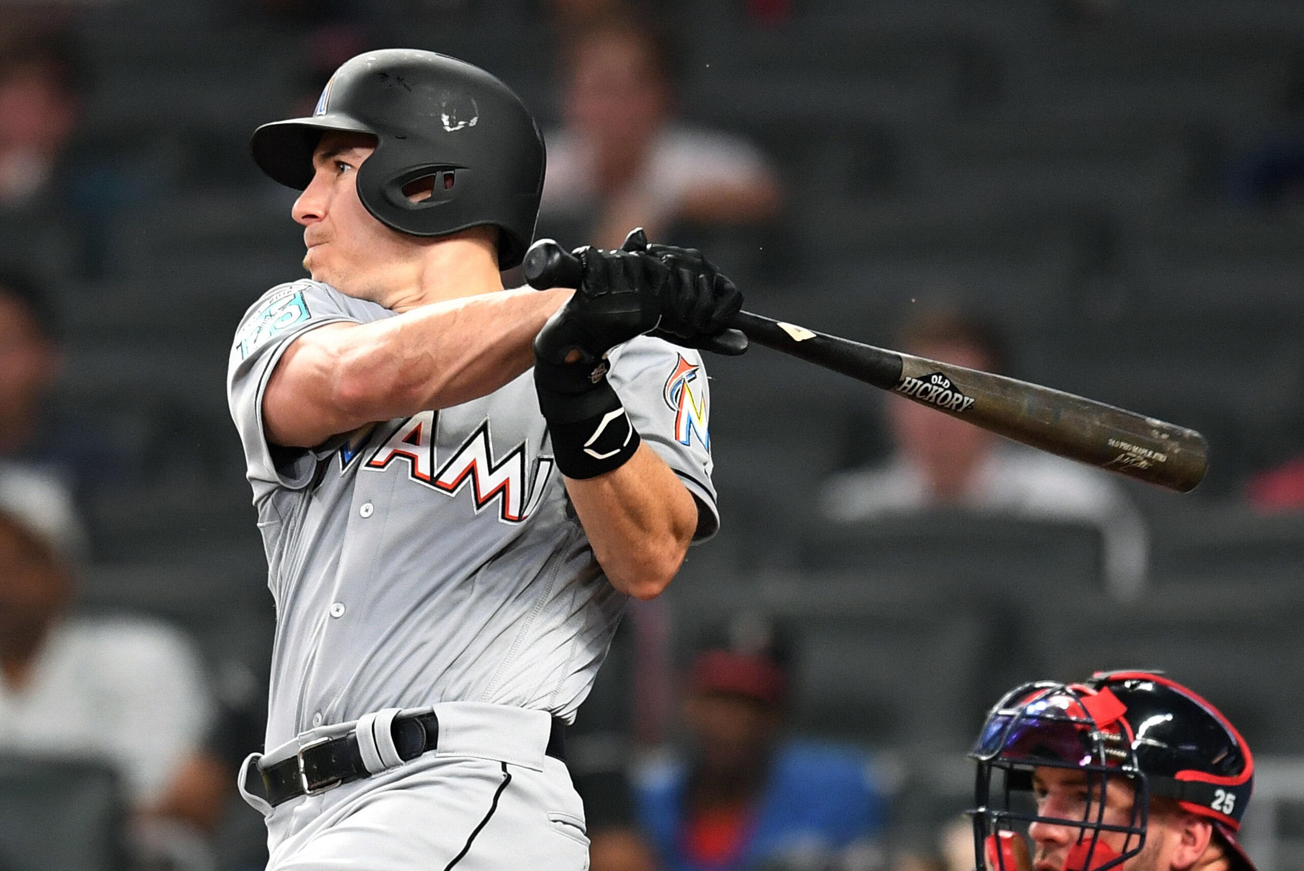 ATLANTA, GA - JULY 30: J. T. Realmuto #11 of the Miami Marlins knocks in a run with a fifth inning double against the Atlanta Braves at SunTrust Park on July 30, 2018 in Atlanta, Georgia. (Photo by Scott Cunningham/Getty Images)