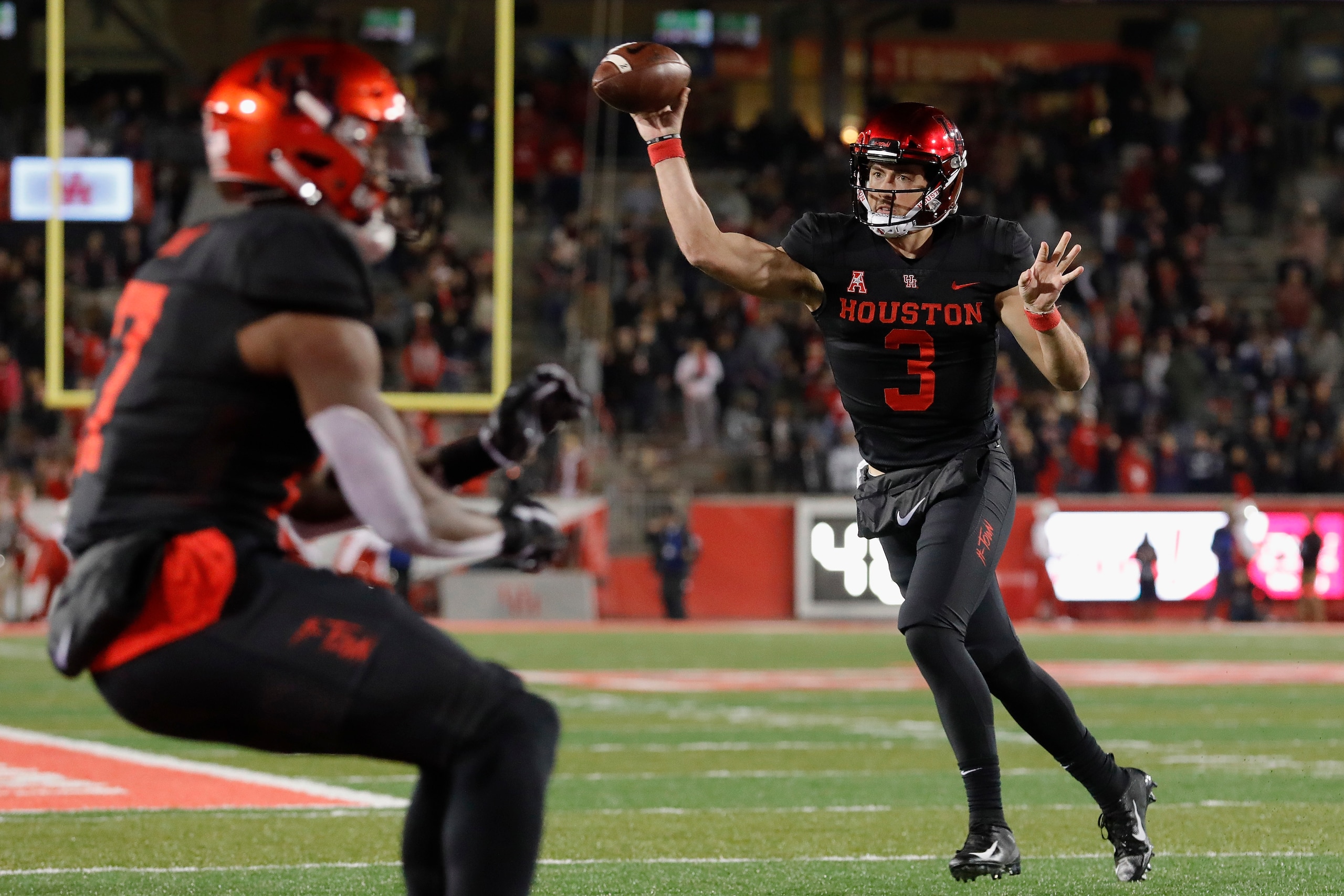 HOUSTON, TX - NOVEMBER 15:  Clayton Tune #3 of the Houston Cougars throws a pass in the second quarter against the Tulane Green Wave at TDECU Stadium on November 15, 2018 in Houston, Texas.  (Photo by Tim Warner/Getty Images)