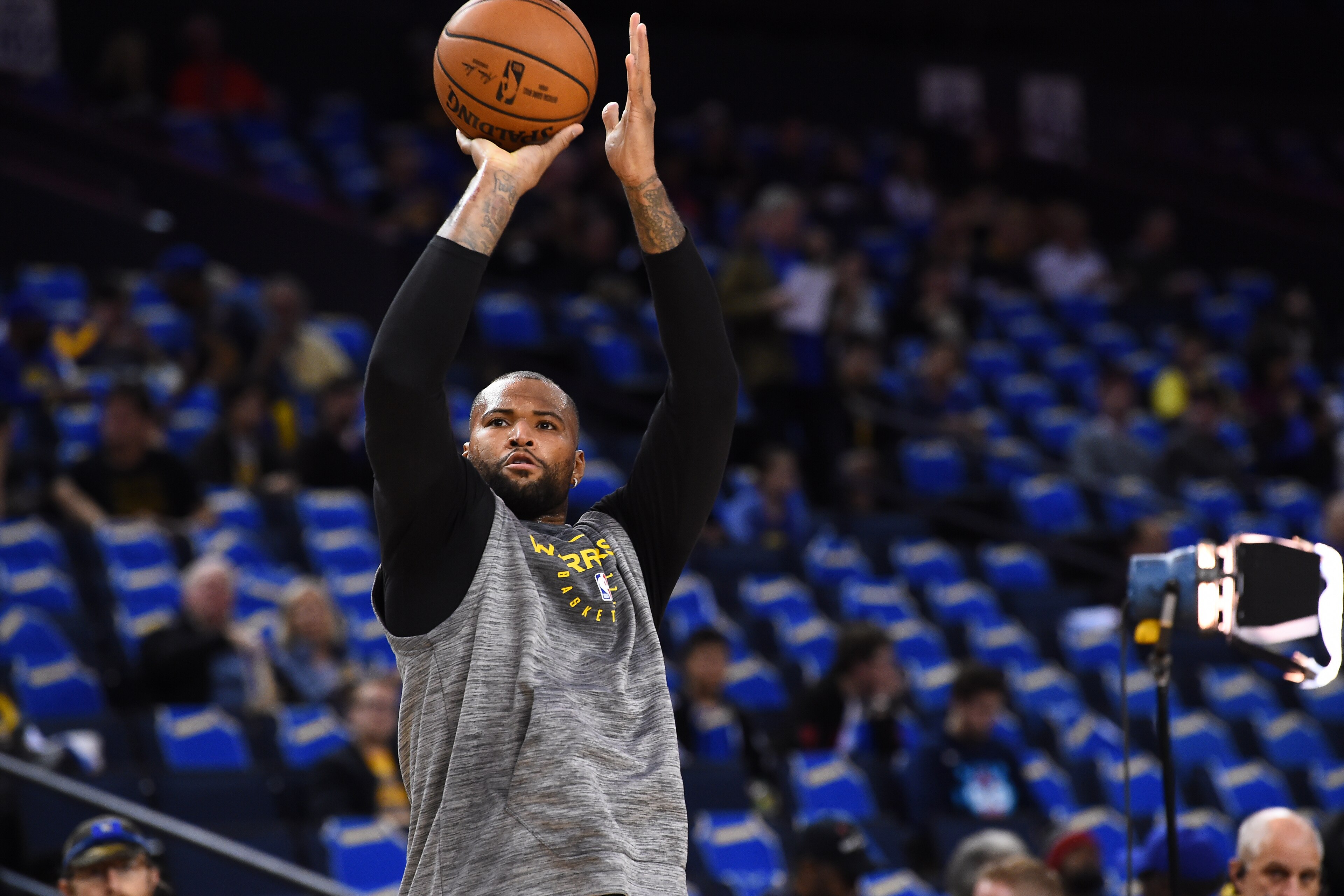 OAKLAND, CA - NOVEMBER 21: DeMarcus Cousins #0 of the Golden State Warriors warms up before the game against the Oklahoma City Thunder on November 21, 2018 at ORACLE Arena in Oakland, California. NOTE TO USER: User expressly acknowledges and agrees that, 