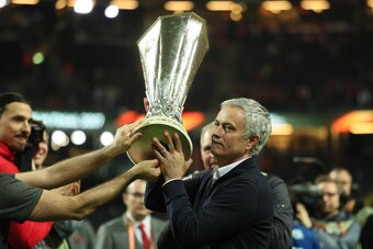 STOCKHOLM, SWEDEN - MAY 24:  Manchester United Head Coach / Manager Jose Mourinho celebrates with the trophy at the end of the UEFA Europa League Final between Ajax and Manchester United at Friends Arena on May 24, 2017 in Stockholm, Sweden.  (Photo by Ma
