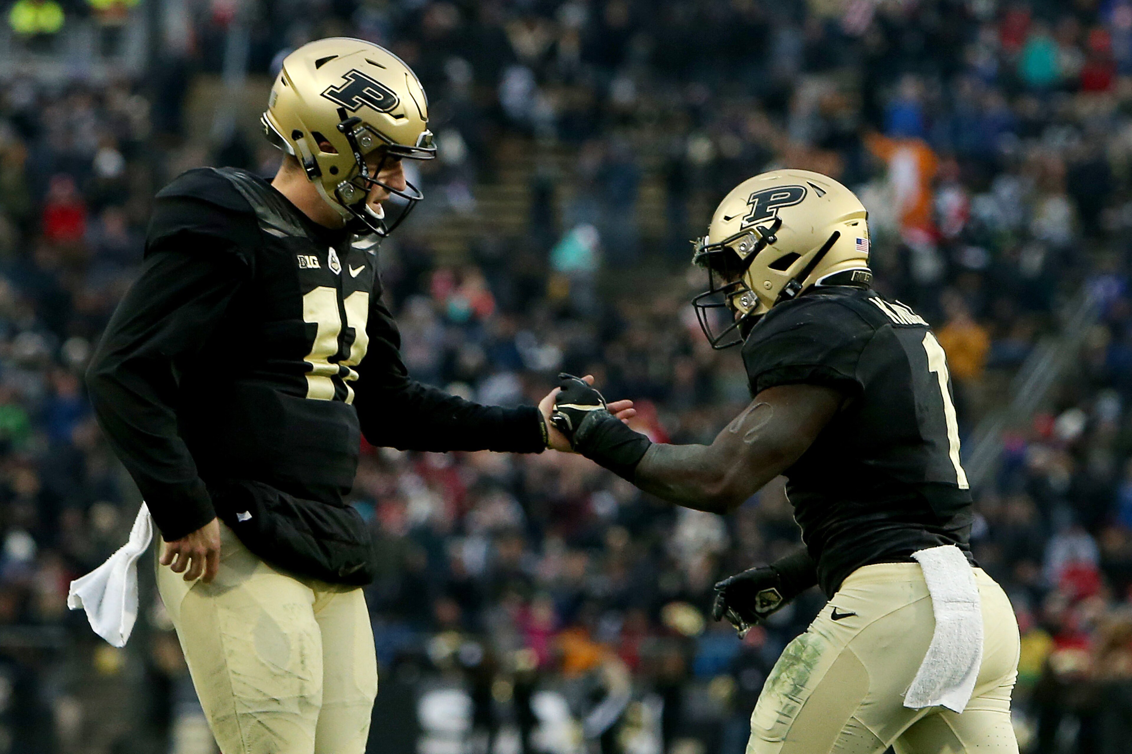 WEST LAFAYETTE, INDIANA - NOVEMBER 17:  David Blough #11 and D.J. Knox #1 of the Purdue Boilermakers celebrate after scoring a touchdown in the second quarter against the Wisconsin Badgers at Ross-Ade Stadium on November 17, 2018 in West Lafayette, Indian