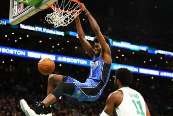 BOSTON, MA - OCTOBER 22:  Jonathan Isaac #1 of the Orlando Magic dunks the ball over Kyrie Irving #11 of the Boston Celtics in the second quarter of a game at TD Garden on October 22, 2018 in Boston, Massachusetts. NOTE TO USER: User expressly acknowledge