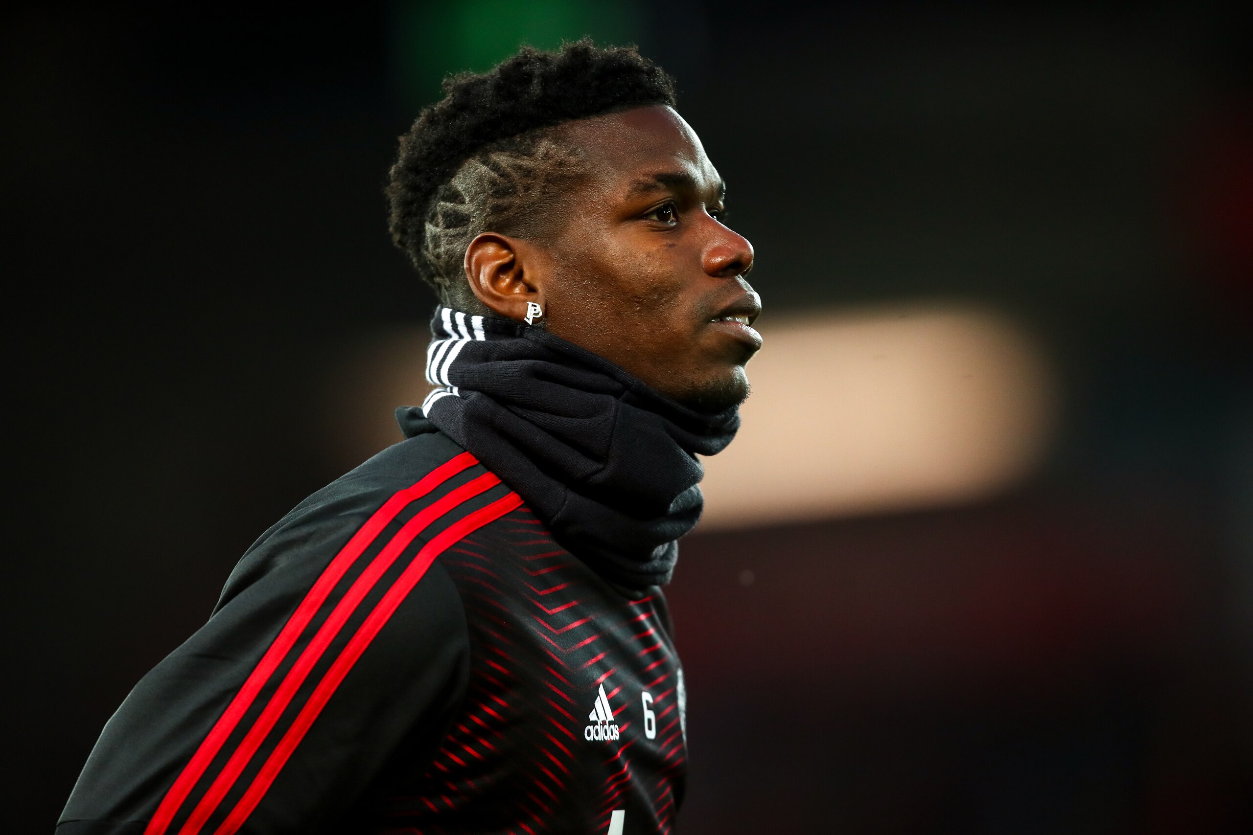 LIVERPOOL, ENGLAND - DECEMBER 16: Paul Pogba of Manchester United warms up prior to the Premier League match between Liverpool FC and Manchester United at Anfield on December 16, 2018 in Liverpool, United Kingdom. (Photo by Robbie Jay Barratt - AMA/Getty 
