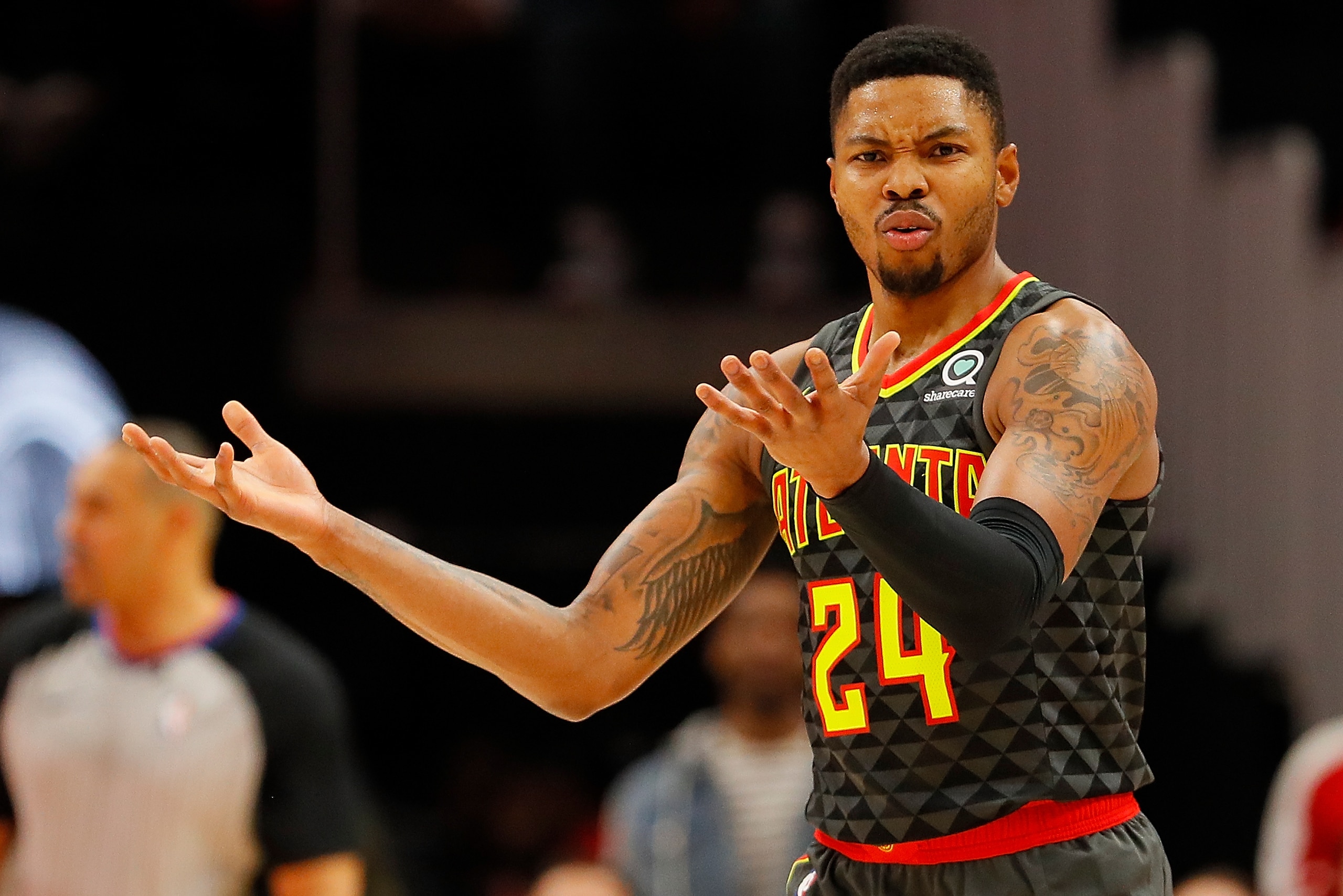 ATLANTA, GA - DECEMBER 05:  Kent Bazemore #24 of the Atlanta Hawks reacts after being charged with a travel against the Washington Wizards at State Farm Arena on December 5, 2018 in Atlanta, Georgia.  NOTE TO USER: User expressly acknowledges and agrees t