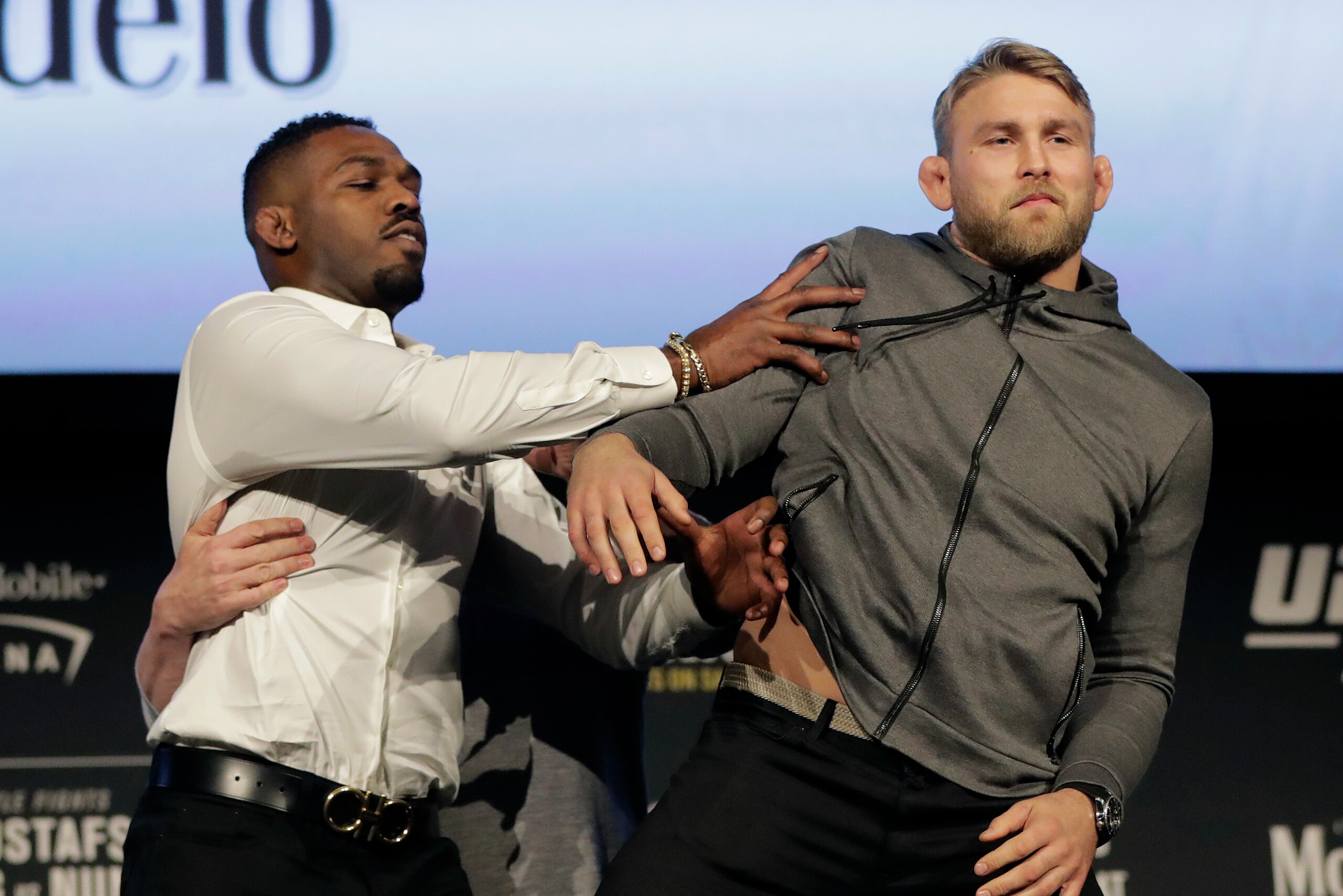 Jones putting his hands on Gustafsson.