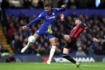 LONDON, ENGLAND - DECEMBER 19: Ruben Loftus-Cheek of Chelsea is challenged by Diego Rico of AFC Bournemouth during the Carabao Cup Quarter Final match between Chelsea and AFC Bournemouth at Stamford Bridge on December 19, 2018 in London, United Kingdom.  