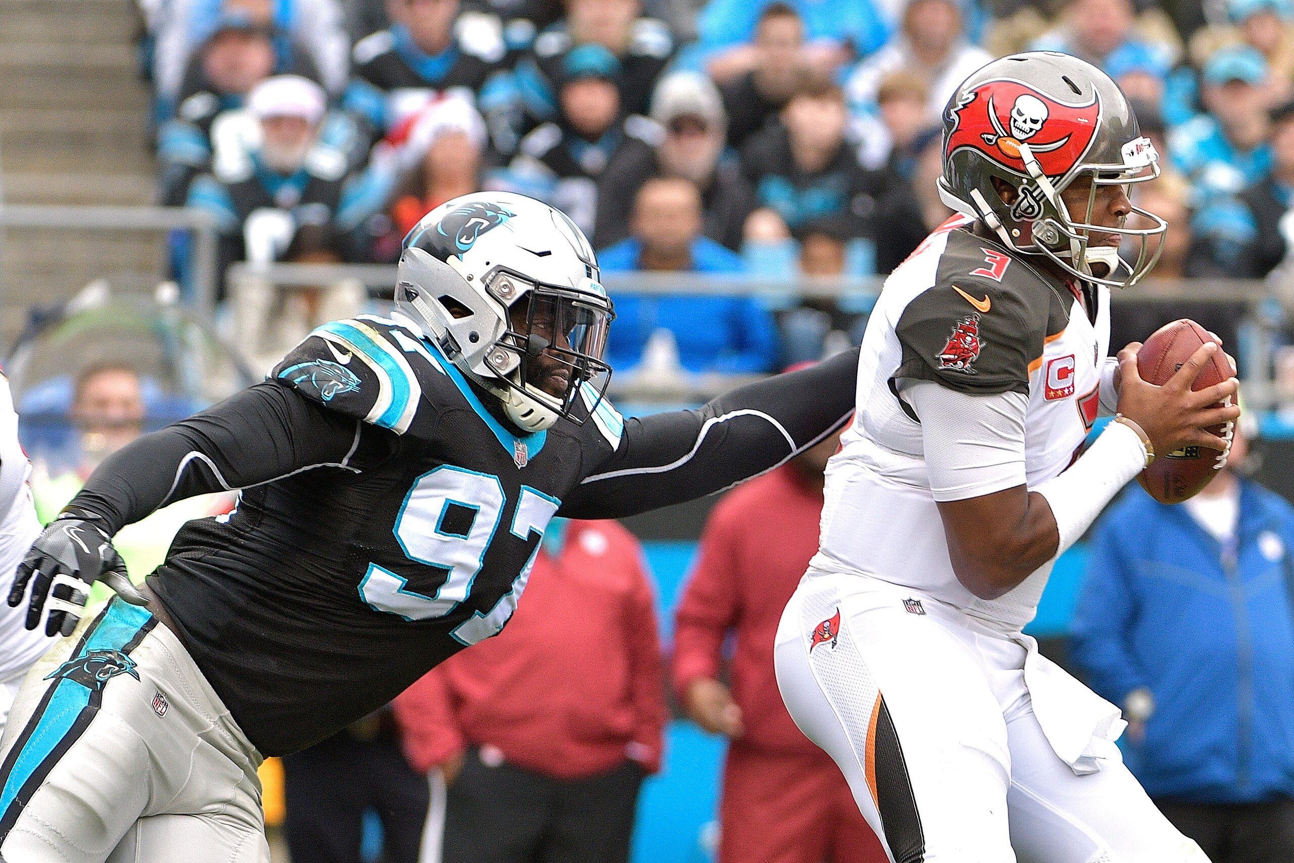 CHARLOTTE, NC - DECEMBER 24: Mario Addison #97 of the Carolina Panthers sacks Jameis Winston #3 of the Tampa Bay Buccaneers during their game at Bank of America Stadium on December 24, 2017 in Charlotte, North Carolina. (Photo by Grant Halverson/Getty I CHARLOTTE, NC - DECEMBER 24: Mario Addison #97 of the Carolina Panthers sacks Jameis Winston #3 of the Tampa Bay Buccaneers during their game at Bank of America Stadium on December 24, 2017 in Charlotte, North Carolina. (Photo by Grant Halverson/Getty I