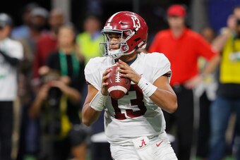 ATLANTA, GA - DECEMBER 01:  Tua Tagovailoa #13 of the Alabama Crimson Tide looks to pass the ball in the second half against the Georgia Bulldogs during the 2018 SEC Championship Game at Mercedes-Benz Stadium on December 1, 2018 in Atlanta, Georgia.  (Pho