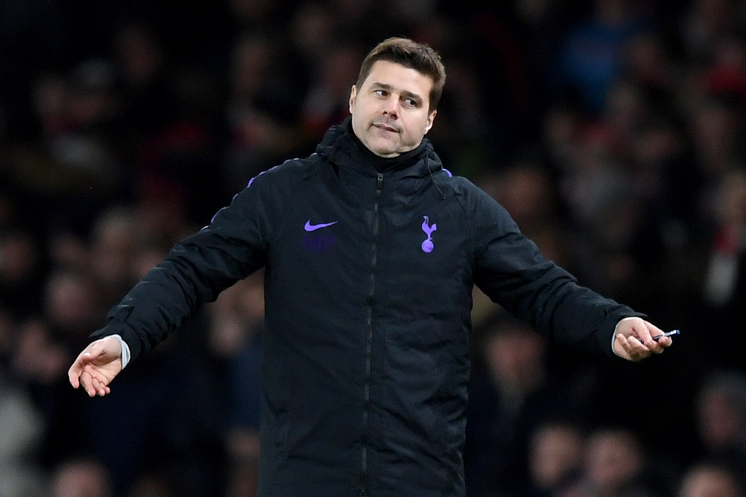 LONDON, ENGLAND - DECEMBER 19:  Mauricio Pochettino, Manager of Tottenham Hotspur reacts during the Carabao Cup Quarter Final match between Arsenal and Tottenham Hotspur at Emirates Stadium on December 19, 2018 in London, United Kingdom.  (Photo by Shaun 