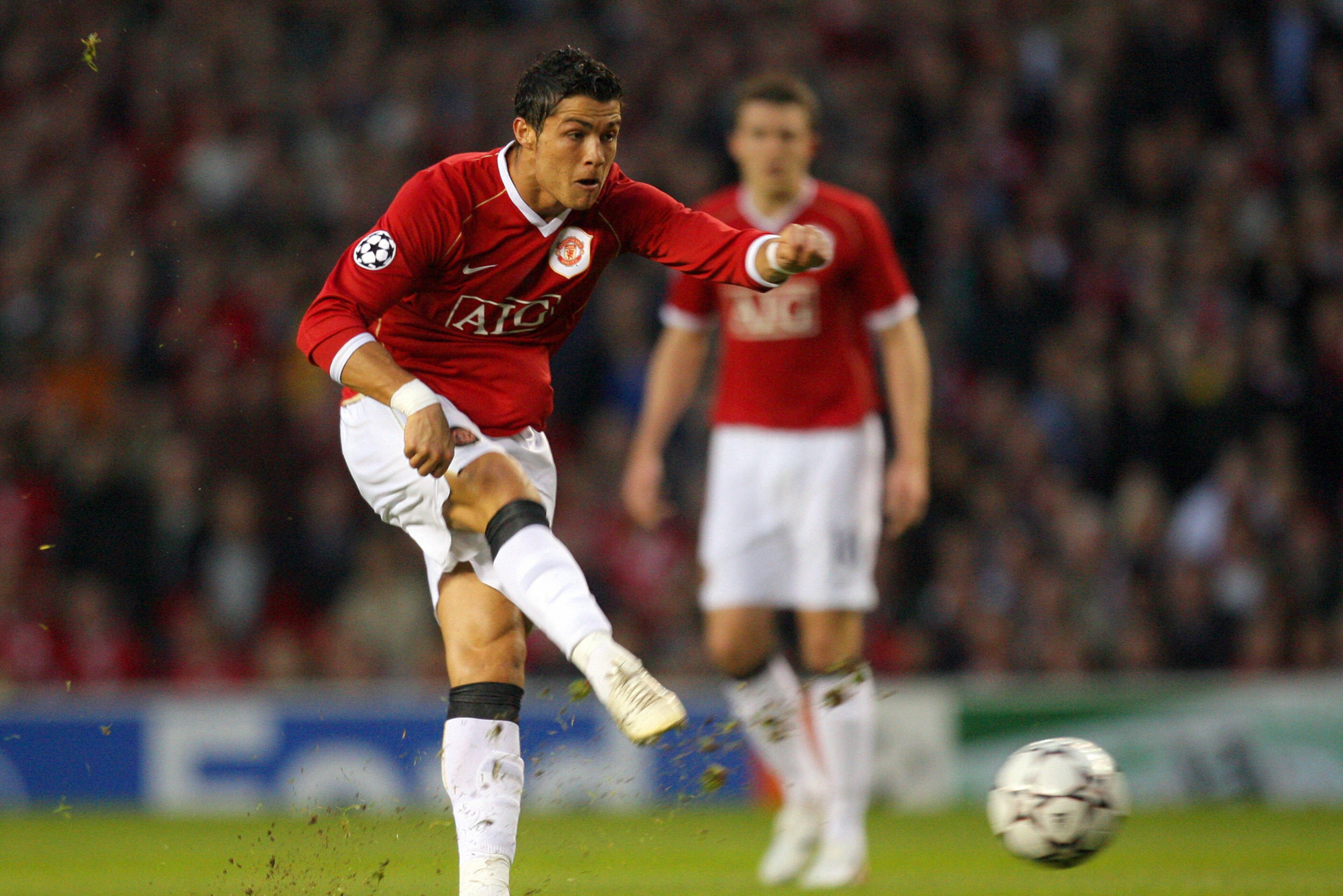 Manchester, UNITED KINGDOM: Manchester United's Portuguese midfielder Cristiano Ronaldo kicks the ball during their European Champions League quarter final second leg football match against AS Roma at Old Trafford in Manchester, north west England, 10 Apr Manchester, UNITED KINGDOM: Manchester United's Portuguese midfielder Cristiano Ronaldo kicks the ball during their European Champions League quarter final second leg football match against AS Roma at Old Trafford in Manchester, north west England, 10 Apr