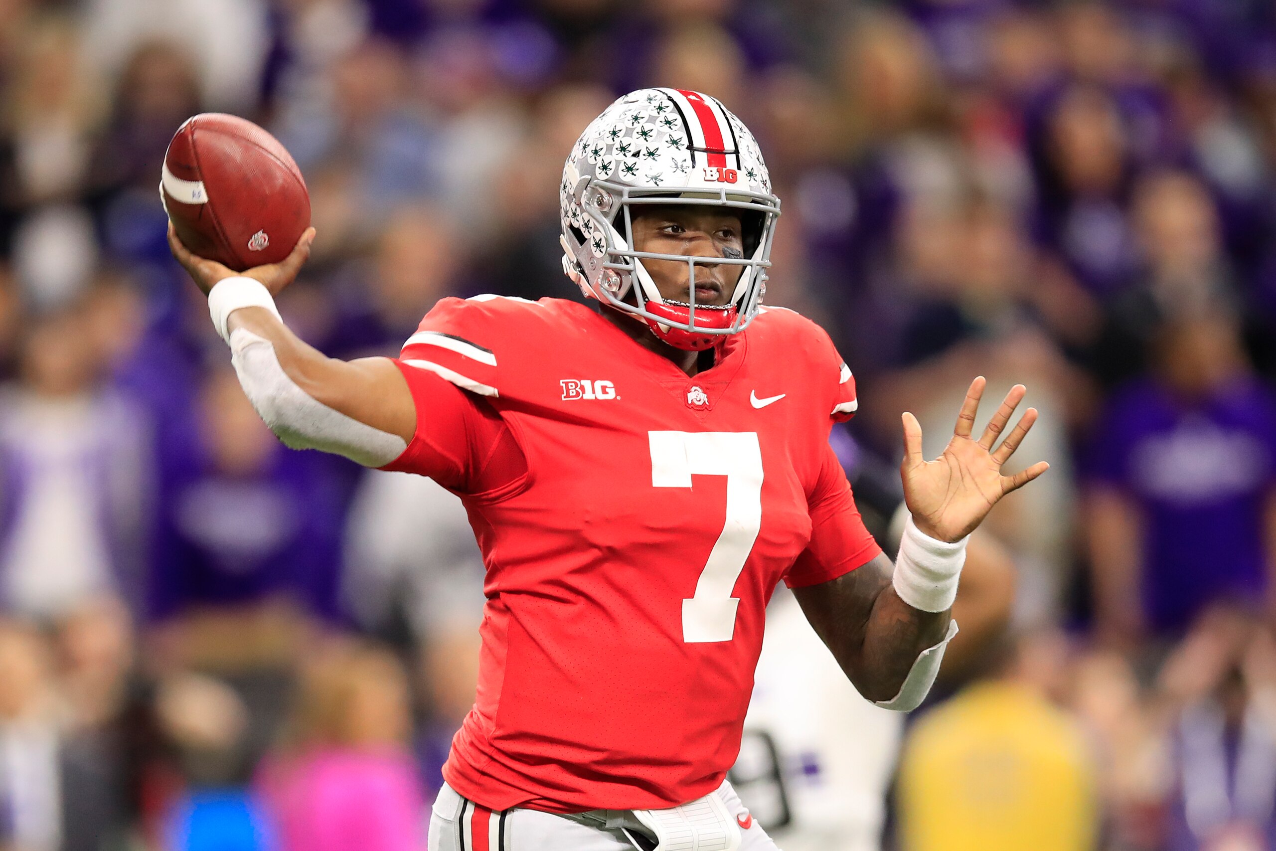 INDIANAPOLIS, INDIANA - DECEMBER 01: Dwayne Haskins Jr. #7 of the Ohio State Buckeyes throws a pass down field in the game against the Northwestern Wildcats in the second quarter at Lucas Oil Stadium on December 01, 2018 in Indianapolis, Indiana. (Photo b INDIANAPOLIS, INDIANA - DECEMBER 01: Dwayne Haskins Jr. #7 of the Ohio State Buckeyes throws a pass down field in the game against the Northwestern Wildcats in the second quarter at Lucas Oil Stadium on December 01, 2018 in Indianapolis, Indiana. (Photo b