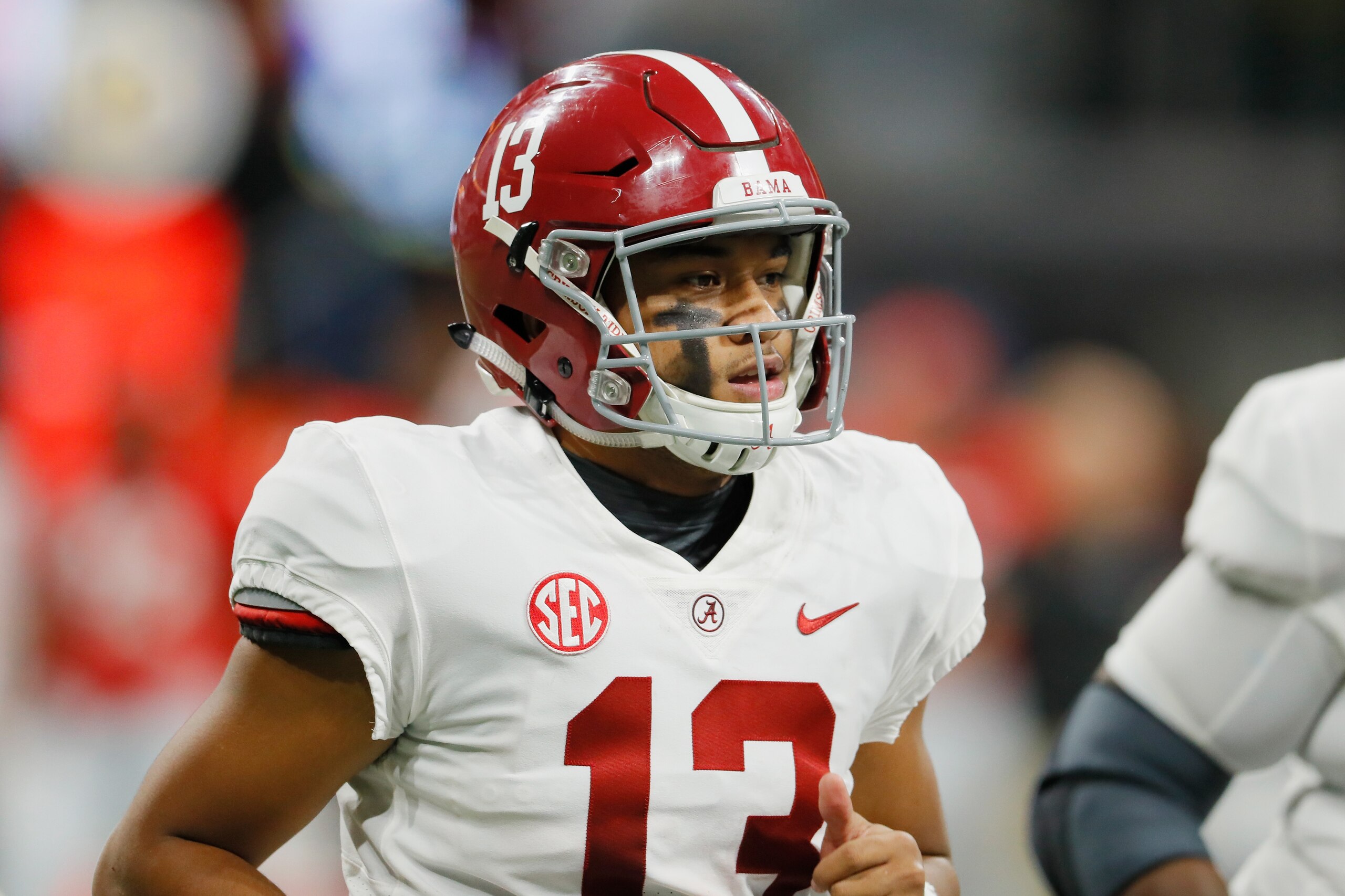 ATLANTA, GA - DECEMBER 01:  Tua Tagovailoa #13 of the Alabama Crimson Tide reacts in the first half against the Georgia Bulldogs during the 2018 SEC Championship Game at Mercedes-Benz Stadium on December 1, 2018 in Atlanta, Georgia.  (Photo by Kevin C. Co