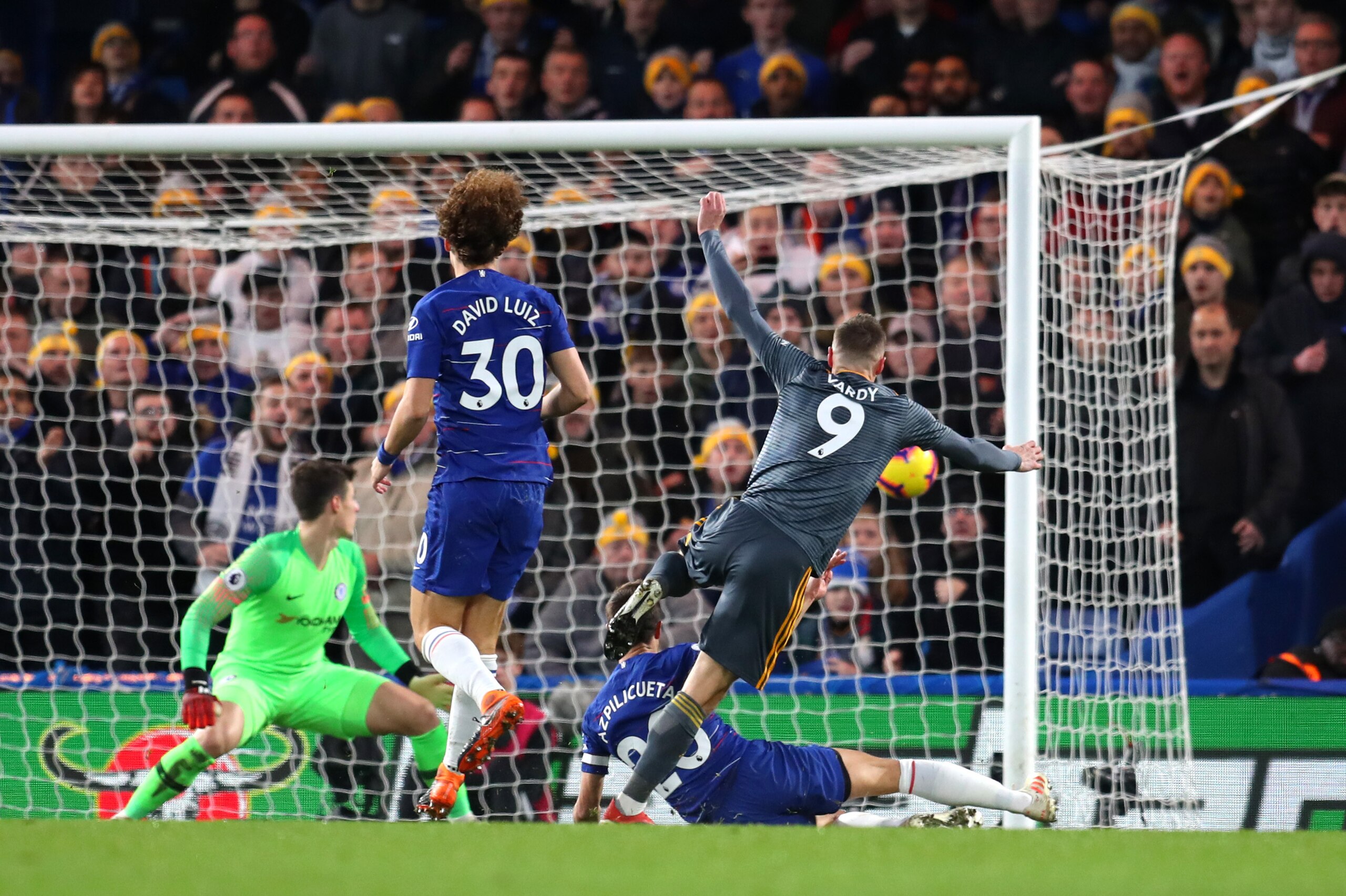 LONDON, ENGLAND - DECEMBER 22:  Jamie Vardy of Leicester City scores his teams first goal during the Premier League match between Chelsea FC and Leicester City at Stamford Bridge on December 22, 2018 in London, United Kingdom.  (Photo by Catherine Ivill/G