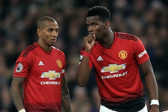 CARDIFF, WALES - DECEMBER 22: Paul Pogba and Ashley Young of Manchester United places the ball for a free kick during the Premier League match between Cardiff City and Manchester United at Cardiff City Stadium on December 22, 2018 in Cardiff, United Kingd