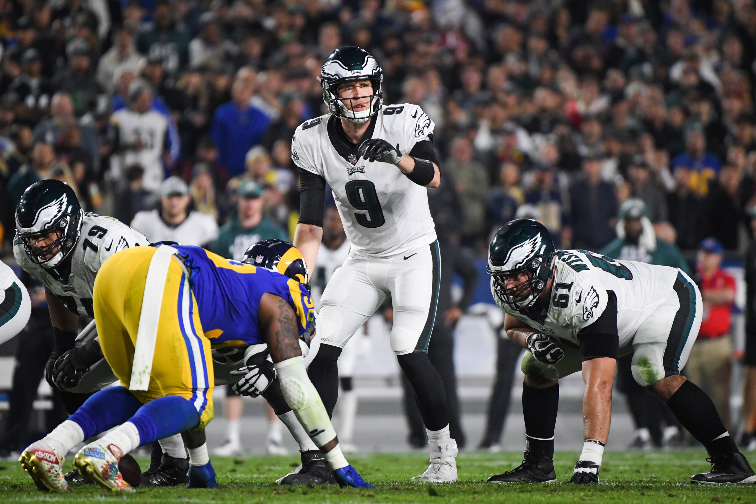 LOS ANGELES, CA - DECEMBER 16: Quarterback Nick Foles #9 of the Philadelphia Eagles motions during the second quarter against the Los Angeles Rams at Los Angeles Memorial Coliseum on December 16, 2018 in Los Angeles, California. (Photo by Harry How/Getty 