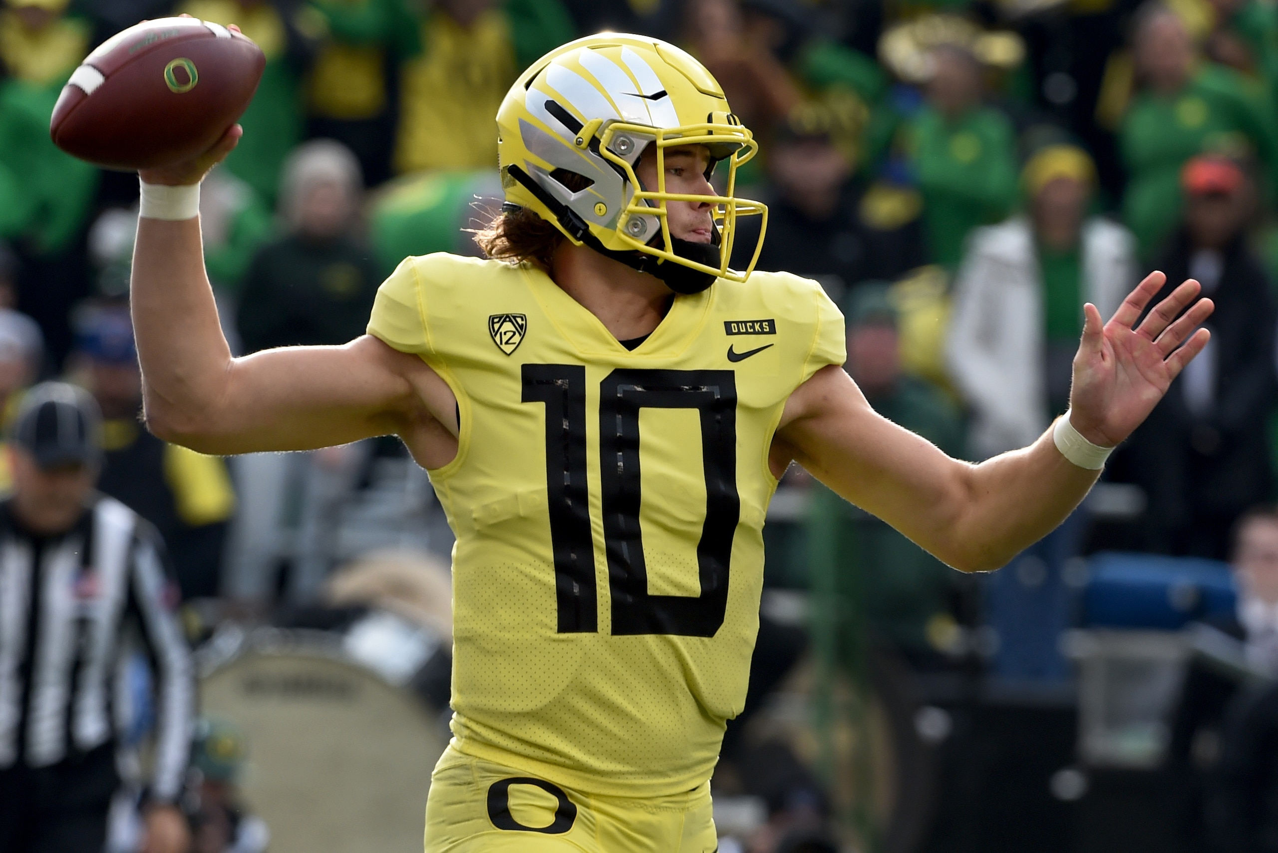 CORVALLIS, OREGON - NOVEMBER 23: Quarterback Justin Herbert #10 of the Oregon Ducks passes the ball during the first half of the game against the Oregon State Beavers at Reser Stadium on November 23, 2018 in Corvallis, Oregon. (Photo by Steve Dykes/Getty CORVALLIS, OREGON - NOVEMBER 23: Quarterback Justin Herbert #10 of the Oregon Ducks passes the ball during the first half of the game against the Oregon State Beavers at Reser Stadium on November 23, 2018 in Corvallis, Oregon. (Photo by Steve Dykes/Getty
