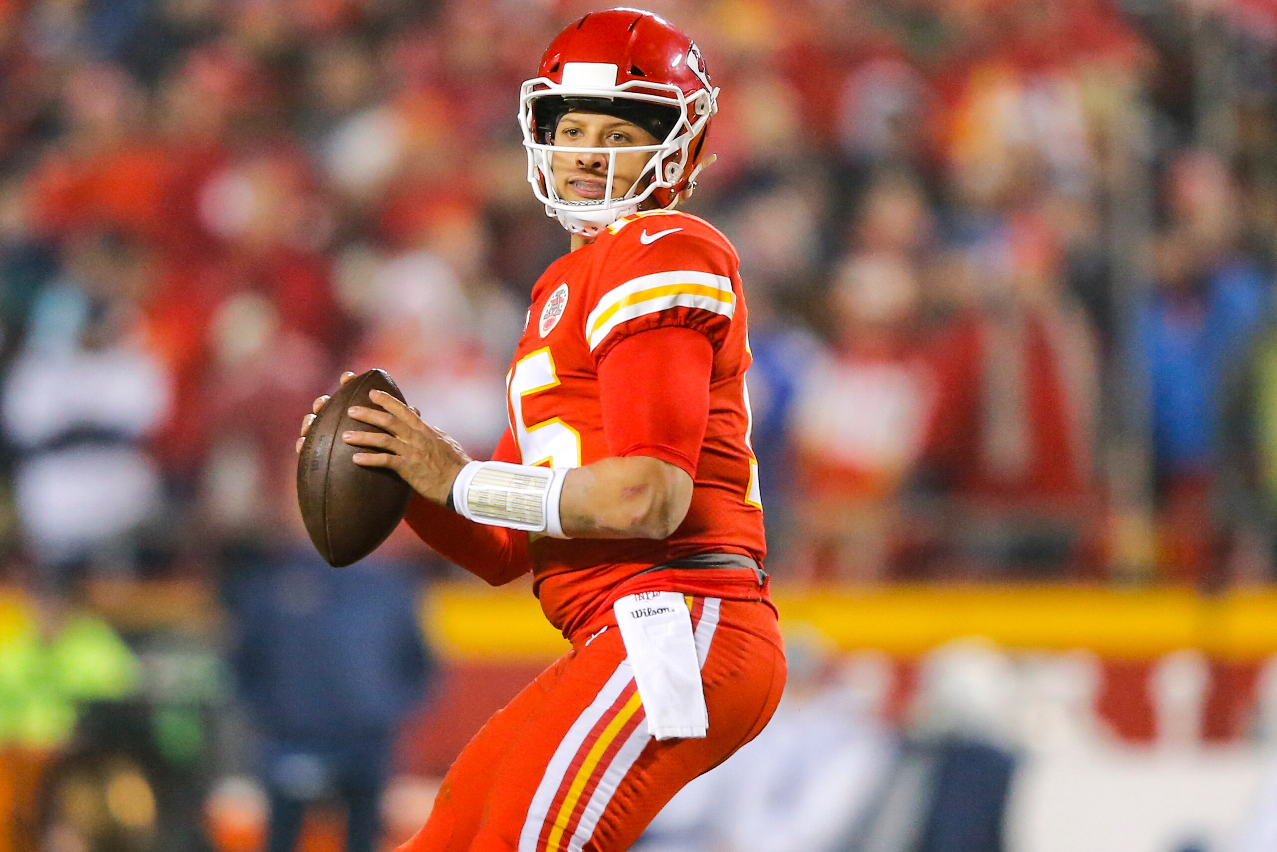 KANSAS CITY, MO - DECEMBER 13: Quarterback Patrick Mahomes #15 of the Kansas City Chiefs drops back to pass against the Los Angeles Chargers at Arrowhead Stadium on December 13, 2018 in Kansas City, Missouri. (Photo by David Eulitt/Getty Images)