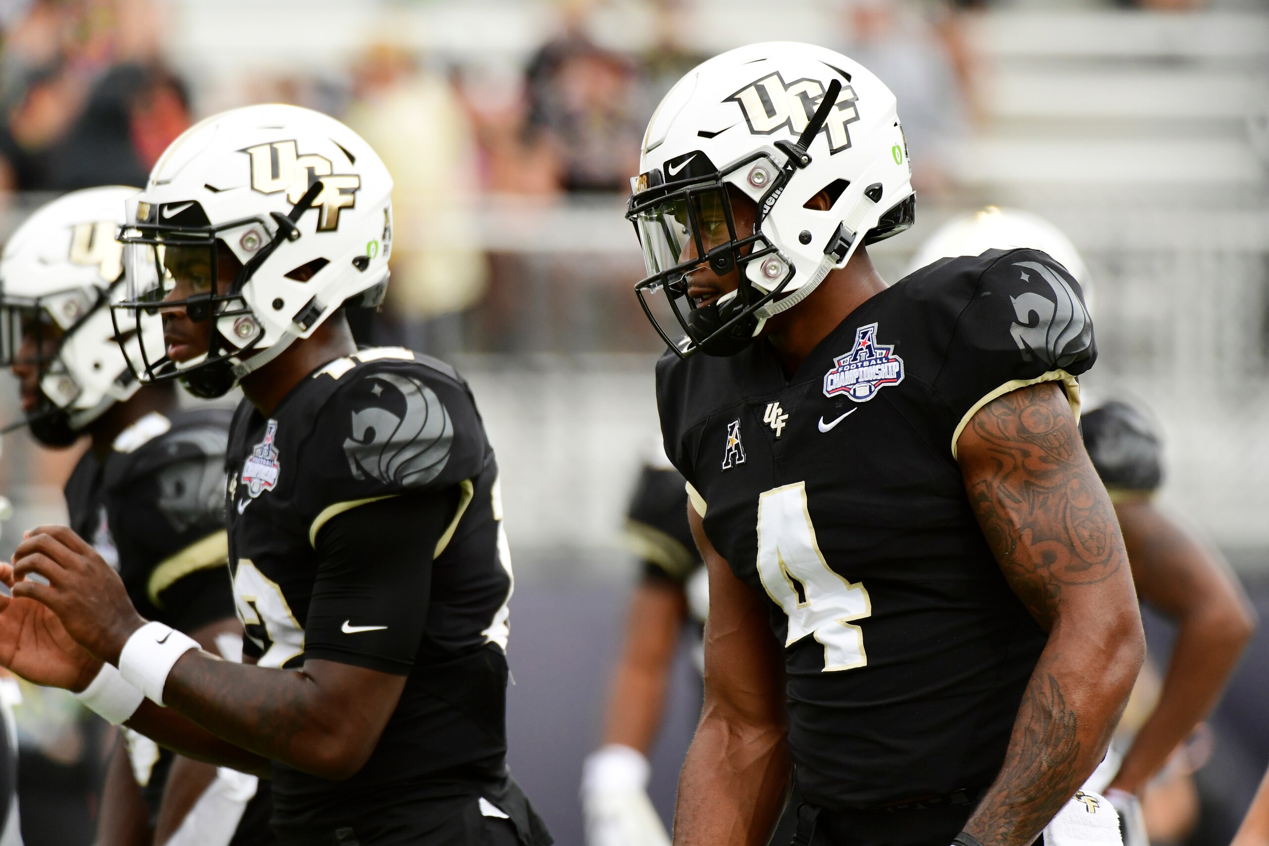 ORLANDO, FLORIDA - DECEMBER 01: Taj McGowan #4 of the UCF Knights lines up during warm-up before the American Athletic Championship against the Memphis Tigers at Spectrum Stadium on December 01, 2018 in Orlando, Florida. (Photo by Julio Aguilar/Getty Imag