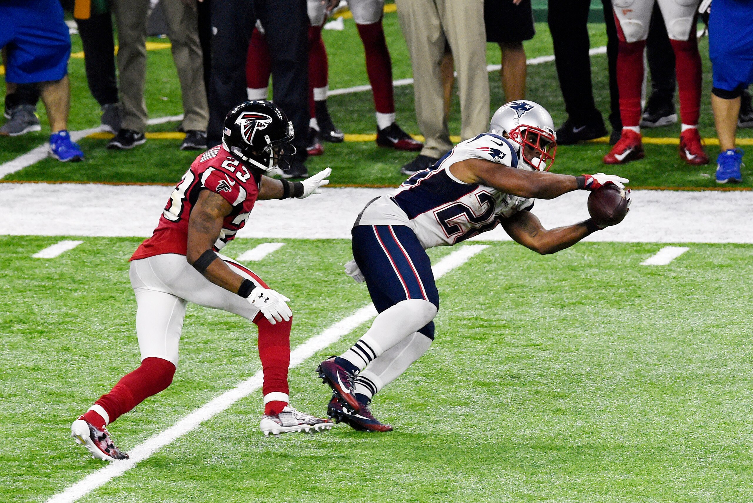 HOUSTON, TX - FEBRUARY 05: James White #28 of the New England Patriots catches a pass in front of Robert Alford #23 of the Atlanta Falcons during Super Bowl 51 at NRG Stadium on February 5, 2017 in Houston, Texas. The Patriots defeat the Atlanta Falcons 3 HOUSTON, TX - FEBRUARY 05: James White #28 of the New England Patriots catches a pass in front of Robert Alford #23 of the Atlanta Falcons during Super Bowl 51 at NRG Stadium on February 5, 2017 in Houston, Texas. The Patriots defeat the Atlanta Falcons 3