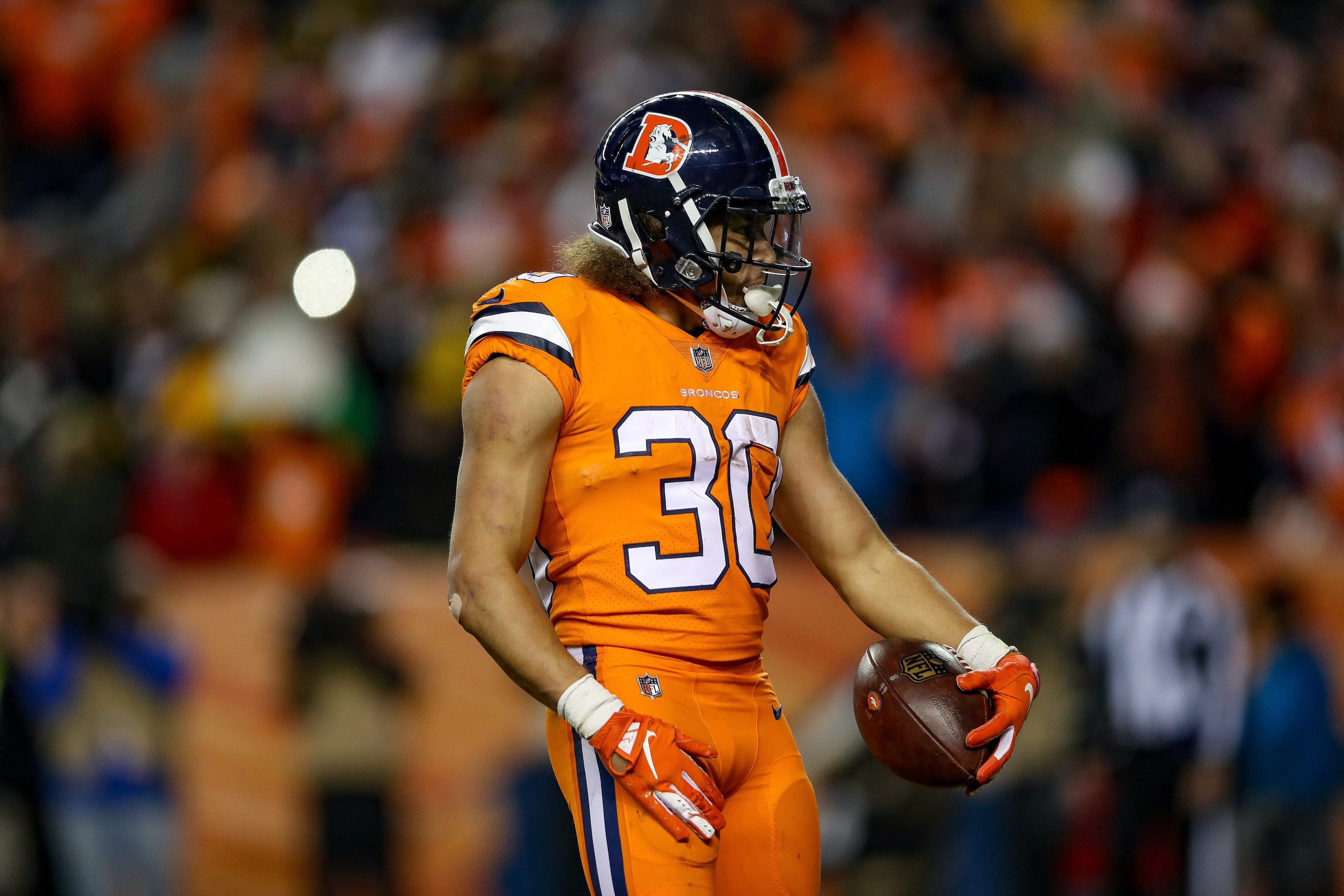DENVER, CO - NOVEMBER 25:  Running back Phillip Lindsay #30 of the Denver Broncos celebrates after a fourth-quarter touchdown against the Pittsburgh Steelers at Broncos Stadium at Mile High on November 25, 2018 in Denver, Colorado. (Photo by Matthew Stock