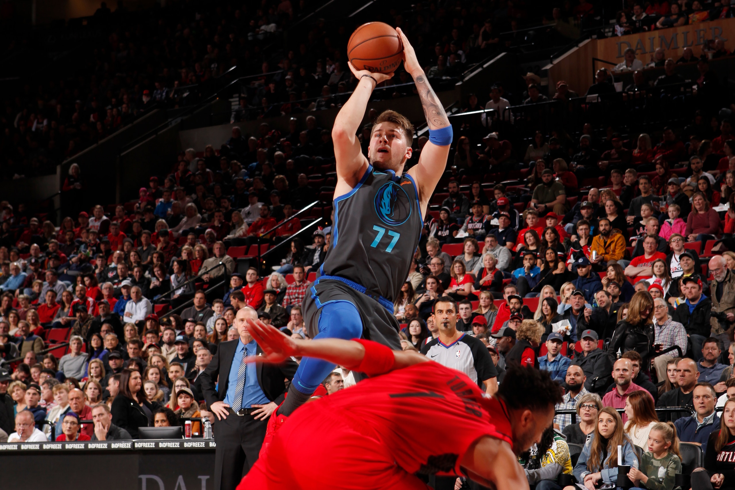 PORTLAND, OR - DECEMBER 23: Luka Doncic #77 of the Dallas Mavericks shoots the ball against the Portland Trail Blazers on December 23, 2018 at the Moda Center Arena in Portland, Oregon. NOTE TO USER: User expressly acknowledges and agrees that, by downloa
