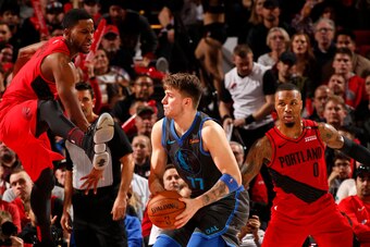 PORTLAND, OR - DECEMBER 23: Luka Doncic #77 of the Dallas Mavericks looks to shoot against the Portland Trail Blazers on December 23, 2018 at the Moda Center Arena in Portland, Oregon. NOTE TO USER: User expressly acknowledges and agrees that, by download