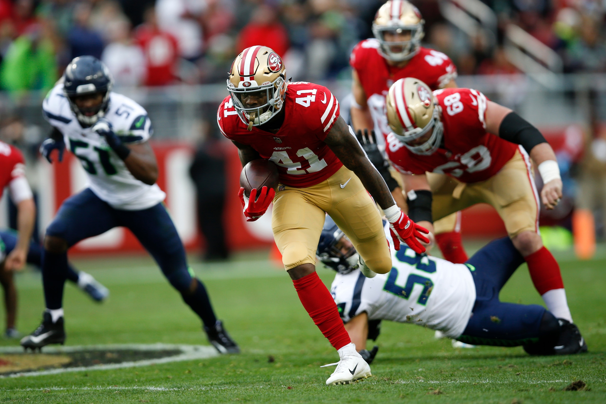 SANTA CLARA, CA - DECEMBER 16: Jeff Wilson Jr. #41 of the San Francisco 49ers rushes during the game against the Seattle Seahawks at Levi's Stadium on December 16, 2018 in Santa Clara, California. The 49ers defeated the Seahawks 26-23. (Photo by Michael Z
