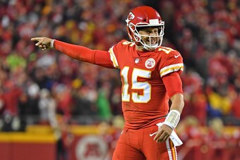 KANSAS CITY, MO - DECEMBER 13:  Quarterback Patrick Mahomes #15 of the Kansas City Chiefs reacts after throwing a touchdown pas during the first half against the Los Angeles Chargers on December 13, 2018 at Arrowhead Stadium in Kansas City, Missouri.  (Ph