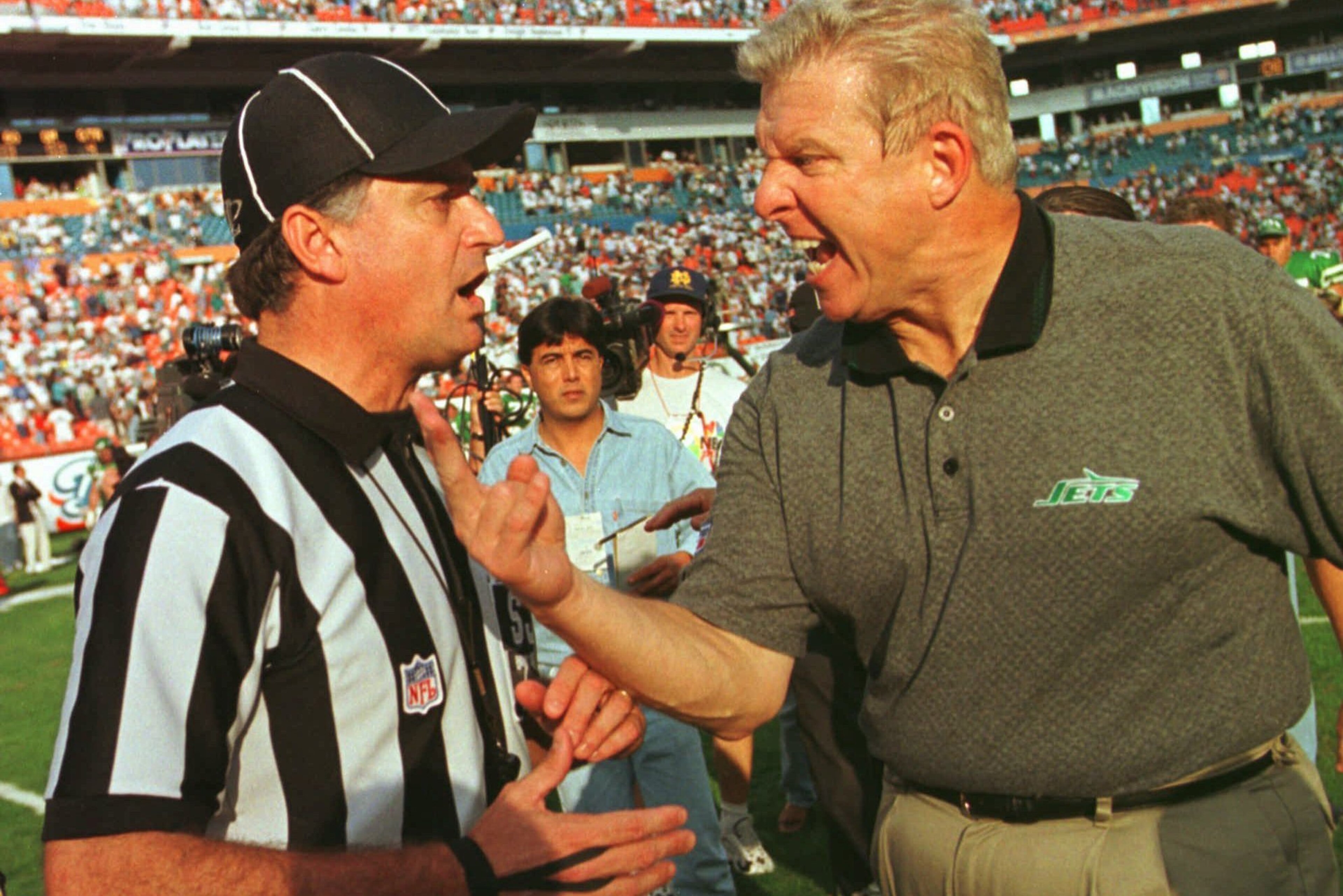 Pereira goes toe to toe with Bill Parcells during his officiating days. Pereira goes toe to toe with Bill Parcells during his officiating days.