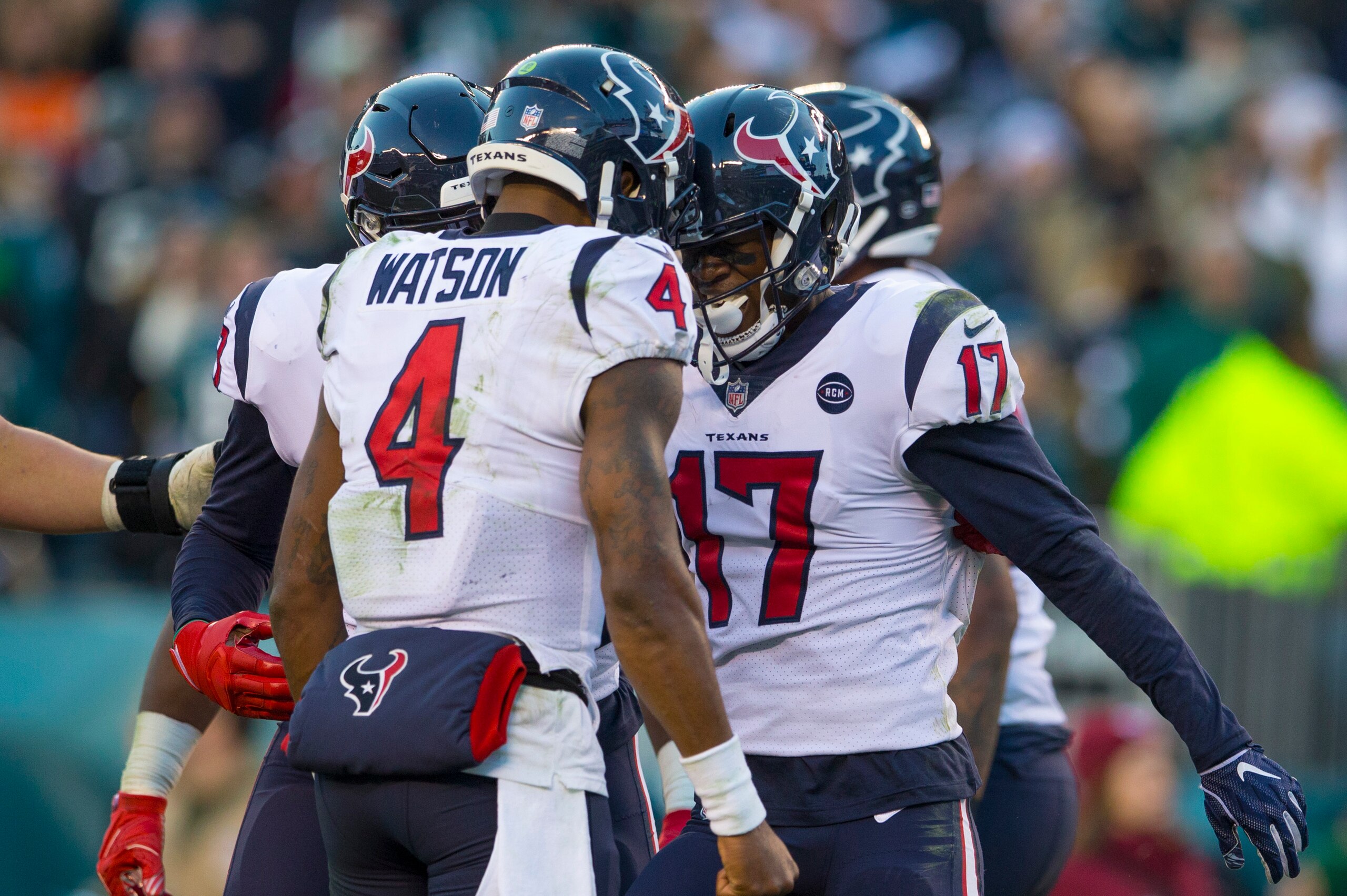 PHILADELPHIA, PA - DECEMBER 23: Deshaun Watson #4 and Vyncint Smith #17 of the Houston Texans celebrate against the Philadelphia Eagles at Lincoln Financial Field on December 23, 2018 in Philadelphia, Pennsylvania. The Eagles defeated the Texans 32-30. (P