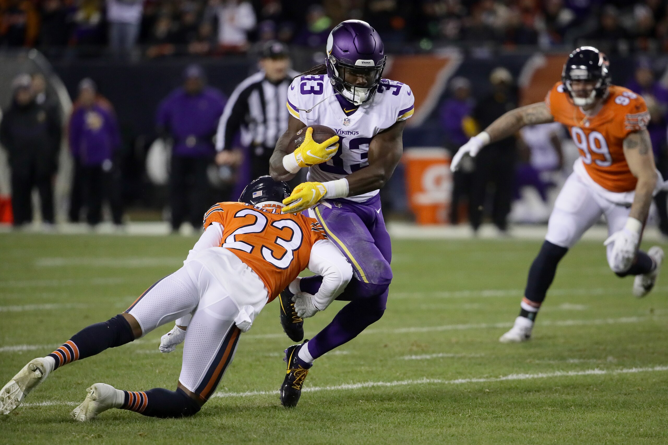 CHICAGO, IL - NOVEMBER 18:  Dalvin Cook #33 of the Minnesota Vikings is hit by Kyle Fuller #23 of the Chicago Bears in the first quarter at Soldier Field on November 18, 2018 in Chicago, Illinois.  (Photo by Jonathan Daniel/Getty Images)