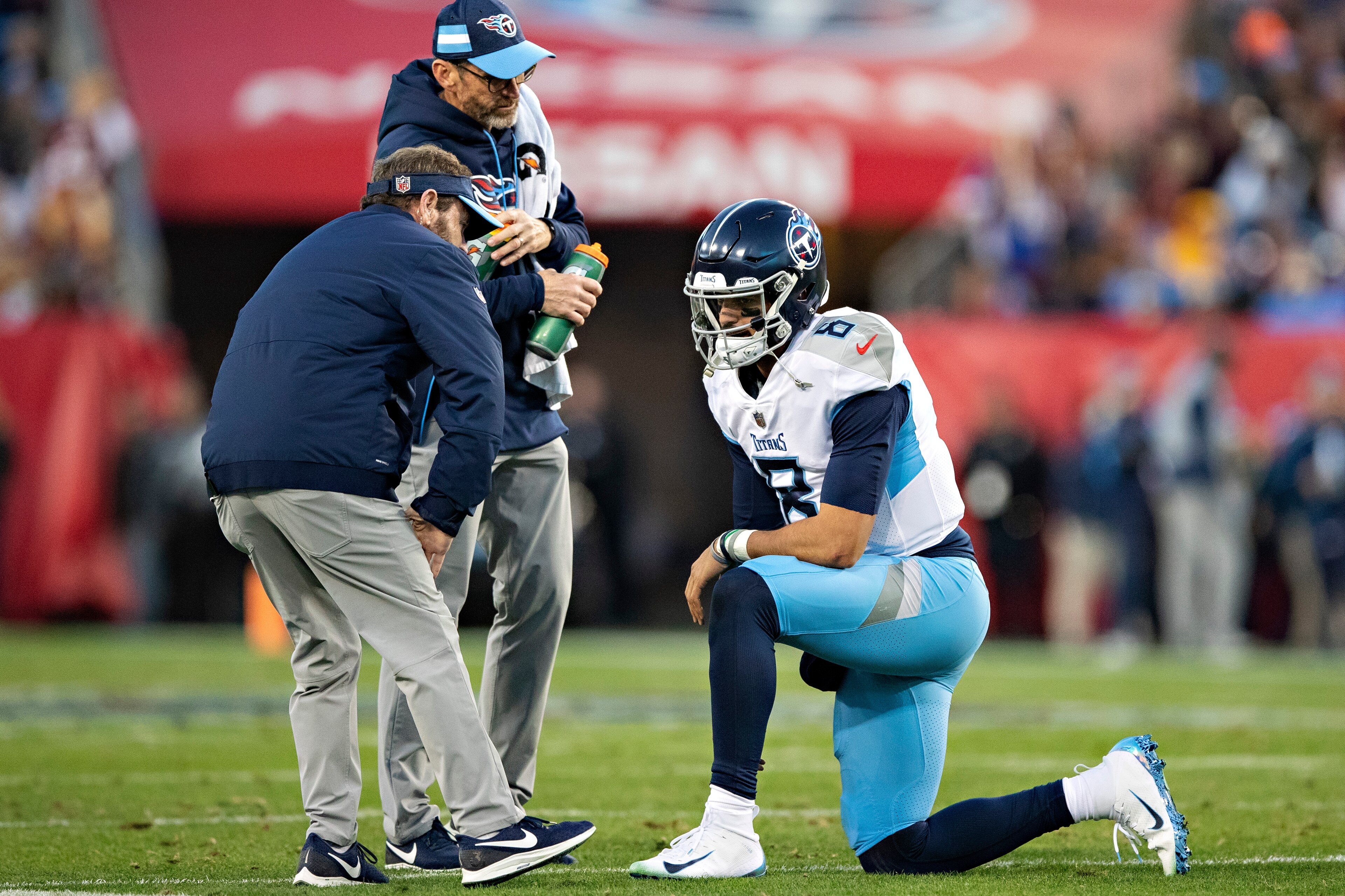 NASHVILLE, TN - DECEMBER 22:  Marcus Mariota #8 of the Tennessee Titans rests on one knee after a hard tackle during a game against the Washington Redskins at Nissan Stadium on December 22, 2018 in Nashville, Tennessee.  The Titans defeated the Redskins 2