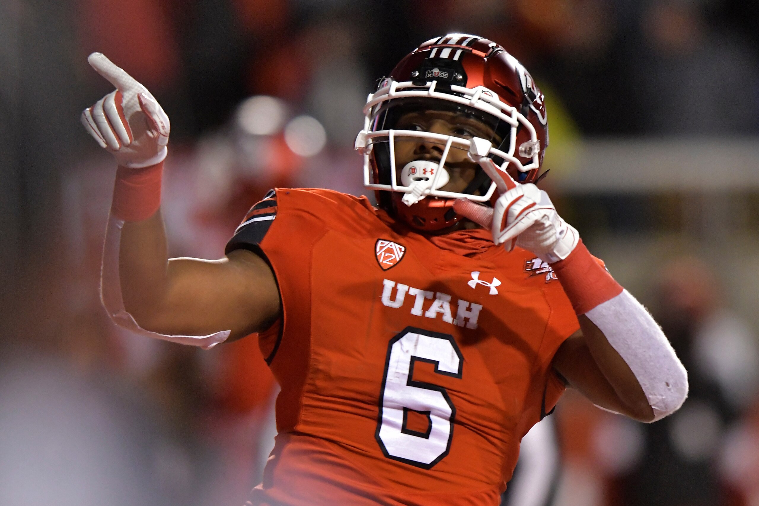 SALT LAKE CITY, UT - NOVEMBER 24: Armand Shyne #6 of the Utah Utes celebrates his touchdown in the second half of a game against the Brigham Young Cougars at Rice-Eccles Stadium on November 24, 2018 in Salt Lake City, Utah. (Photo by Gene Sweeney Jr/Getty