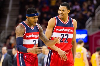 CLEVELAND, OH - DECEMBER 1: Bradley Beal #3 celebrates with Otto Porter Jr. #22 of the Washington Wizards during the second half against the Cleveland Cavaliers at Quicken Loans Arena on December 1, 2015 in Cleveland, Ohio. The Wizards defeated the Cavali