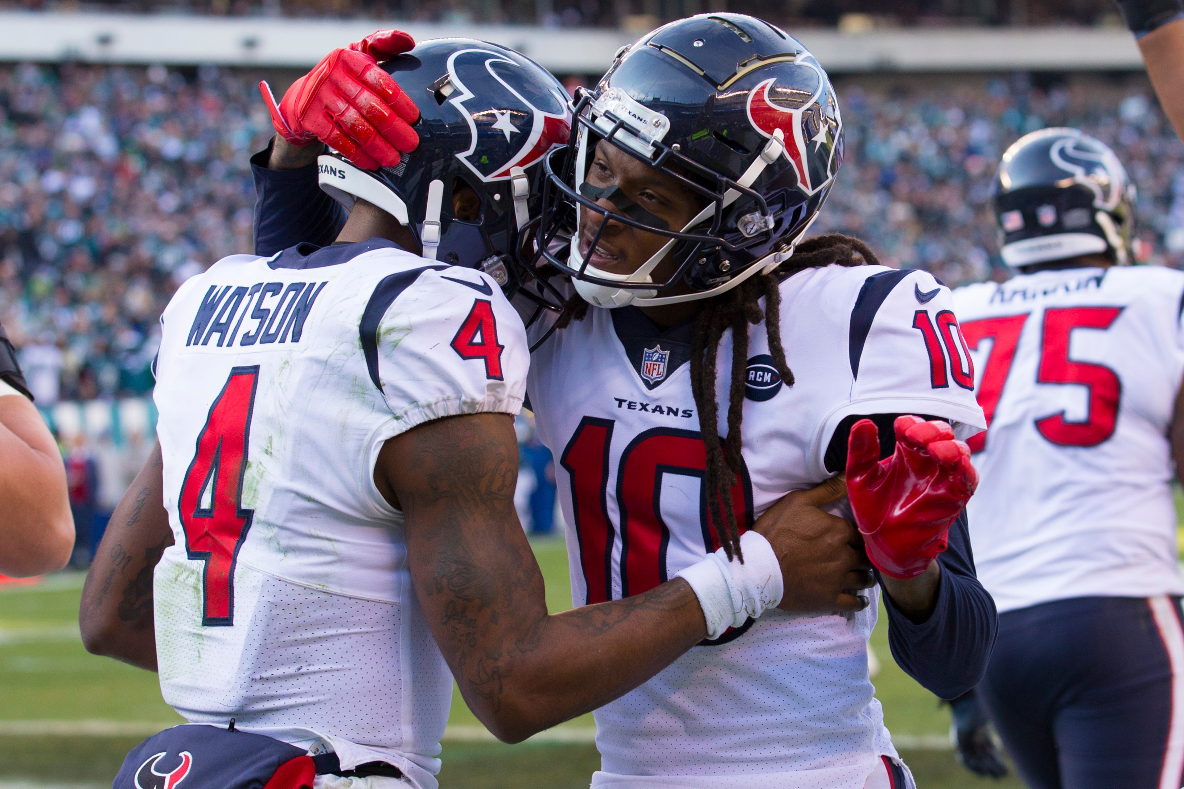 PHILADELPHIA, PA - DECEMBER 23: Deshaun Watson #4 of the Houston Texans celebrates with DeAndre Hopkins #10 against the Philadelphia Eagles at Lincoln Financial Field on December 23, 2018 in Philadelphia, Pennsylvania. The Eagles defeated the Texans 32-30