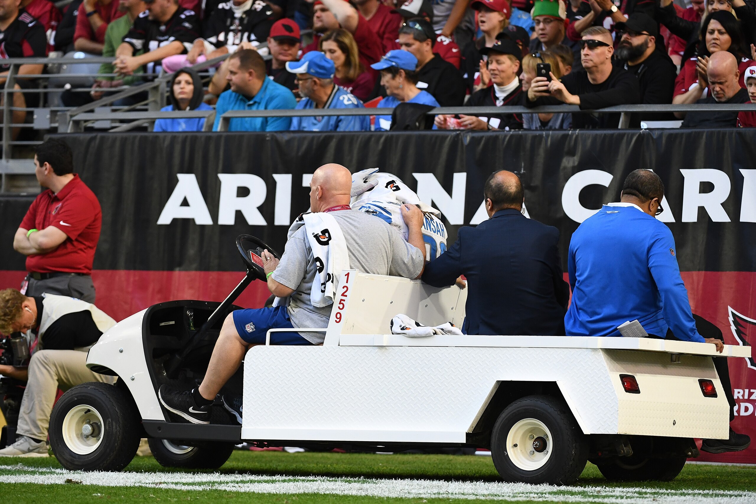 GLENDALE, ARIZONA - DECEMBER 09: Ezekiel Ansah #94 of the Detroit Lions is carted off the field after an injury during the NFL game against the Arizona Cardinals at State Farm Stadium on December 09, 2018 in Glendale, Arizona. (Photo by Jennifer Stewart/G