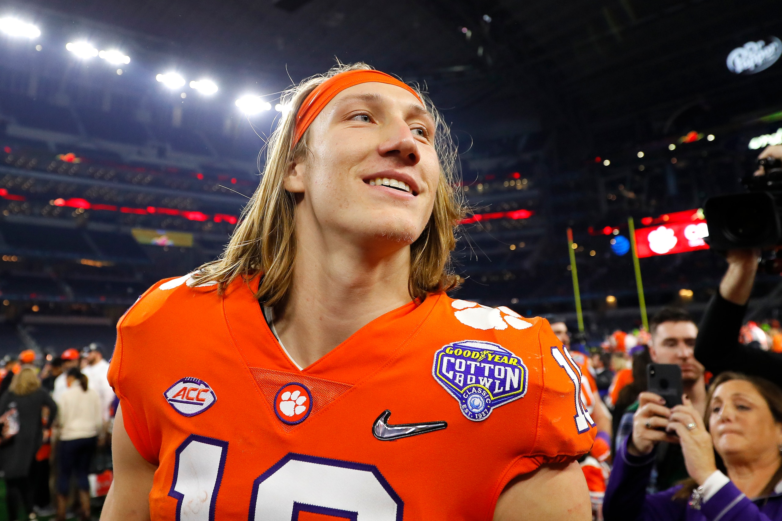 ARLINGTON, TEXAS - DECEMBER 29: Trevor Lawrence #16 of the Clemson Tigers celebrates after defeating the Notre Dame Fighting Irish during the College Football Playoff Semifinal Goodyear Cotton Bowl Classic at AT&T Stadium on December 29, 2018 in Arlington