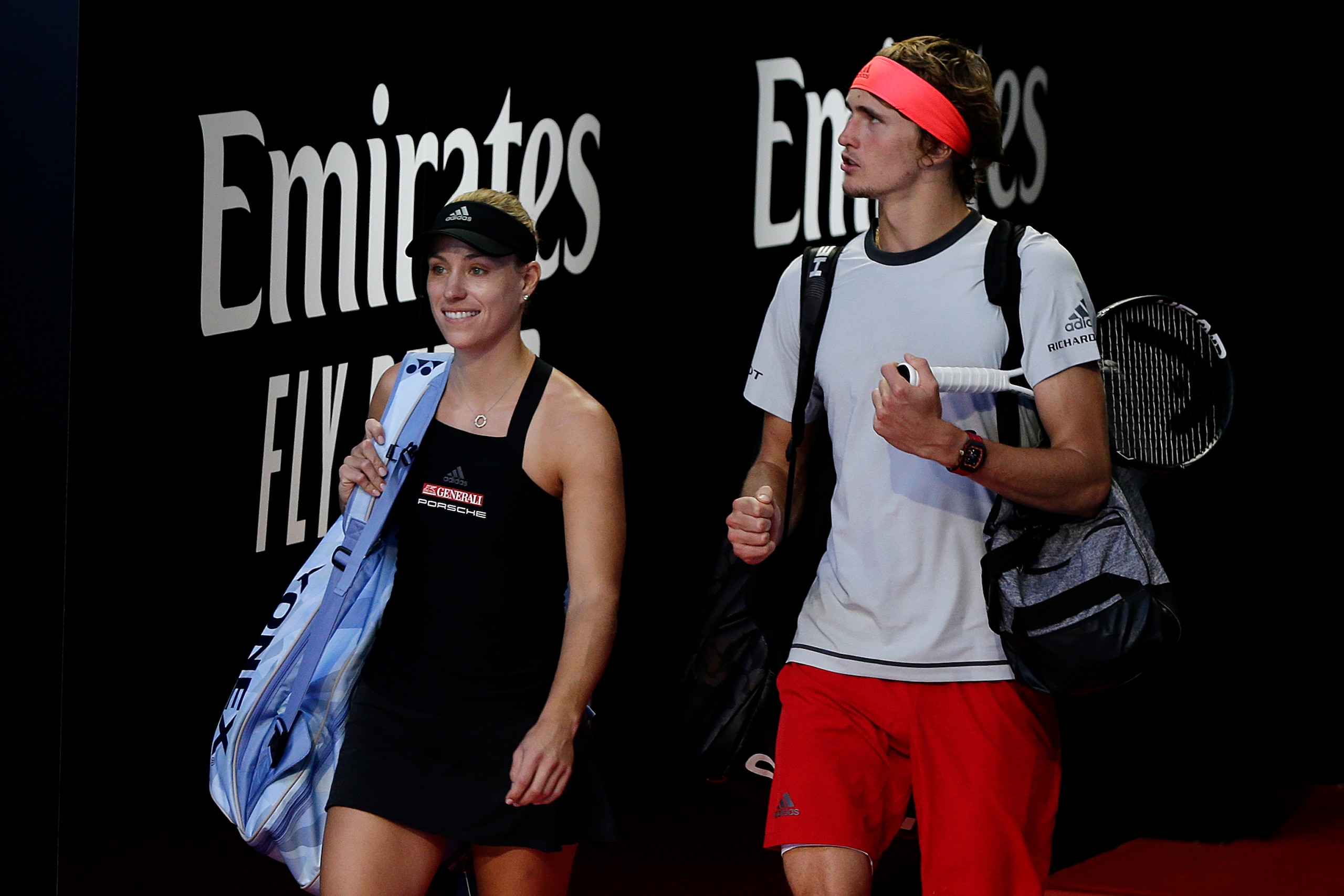 PERTH, AUSTRALIA - DECEMBER 30:  Angelique Kerber and Alexander Zverev of Germany  walk onto court for the mixed doubles match against Garbine Muguruza and David Ferrer of Spain during day two of the 2019 Hopman Cup at RAC Arena on December 30, 2018 in Pe