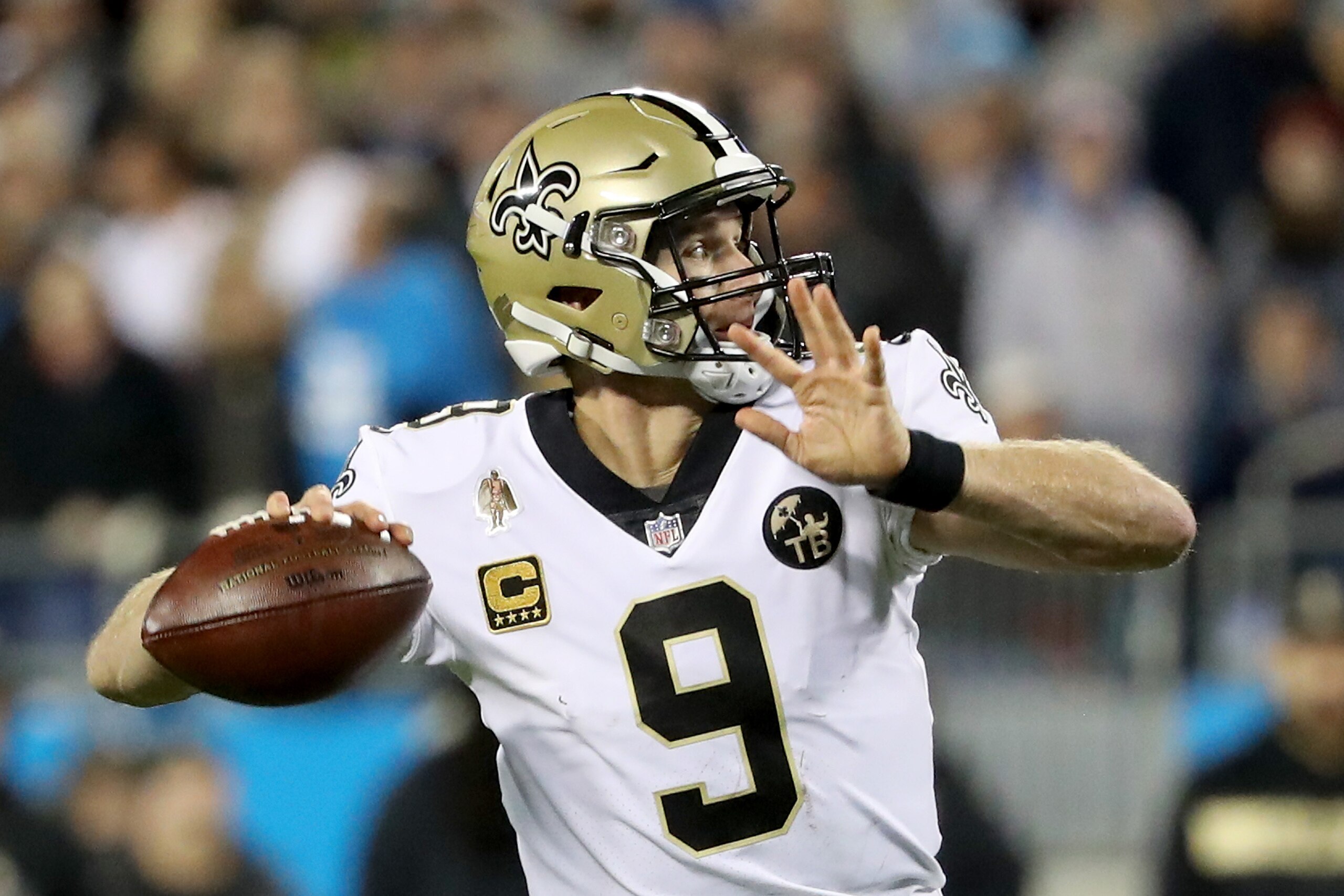 CHARLOTTE, NC - DECEMBER 17:  Drew Brees #9 of the New Orleans Saints throws a pass against the Carolina Panthers in the second quarter during their game at Bank of America Stadium on December 17, 2018 in Charlotte, North Carolina.  (Photo by Streeter Lec