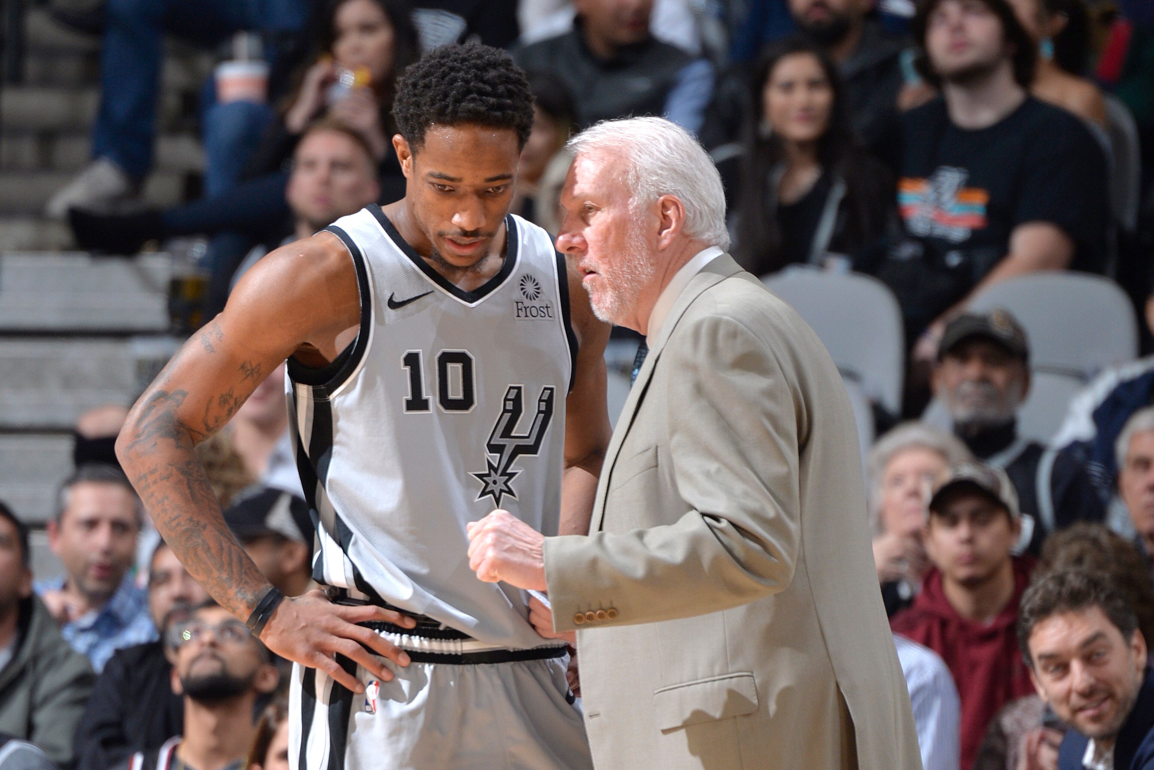 SAN ANTONIO, TX - DECEMBER 15:  Head Coach Gregg Popovich speaks with DeMar DeRozan #10 of the San Antonio Spurs during the game against the Chicago Bulls on December 15, 2018 at the AT&T Center in San Antonio, Texas. NOTE TO USER: User expressly acknowle