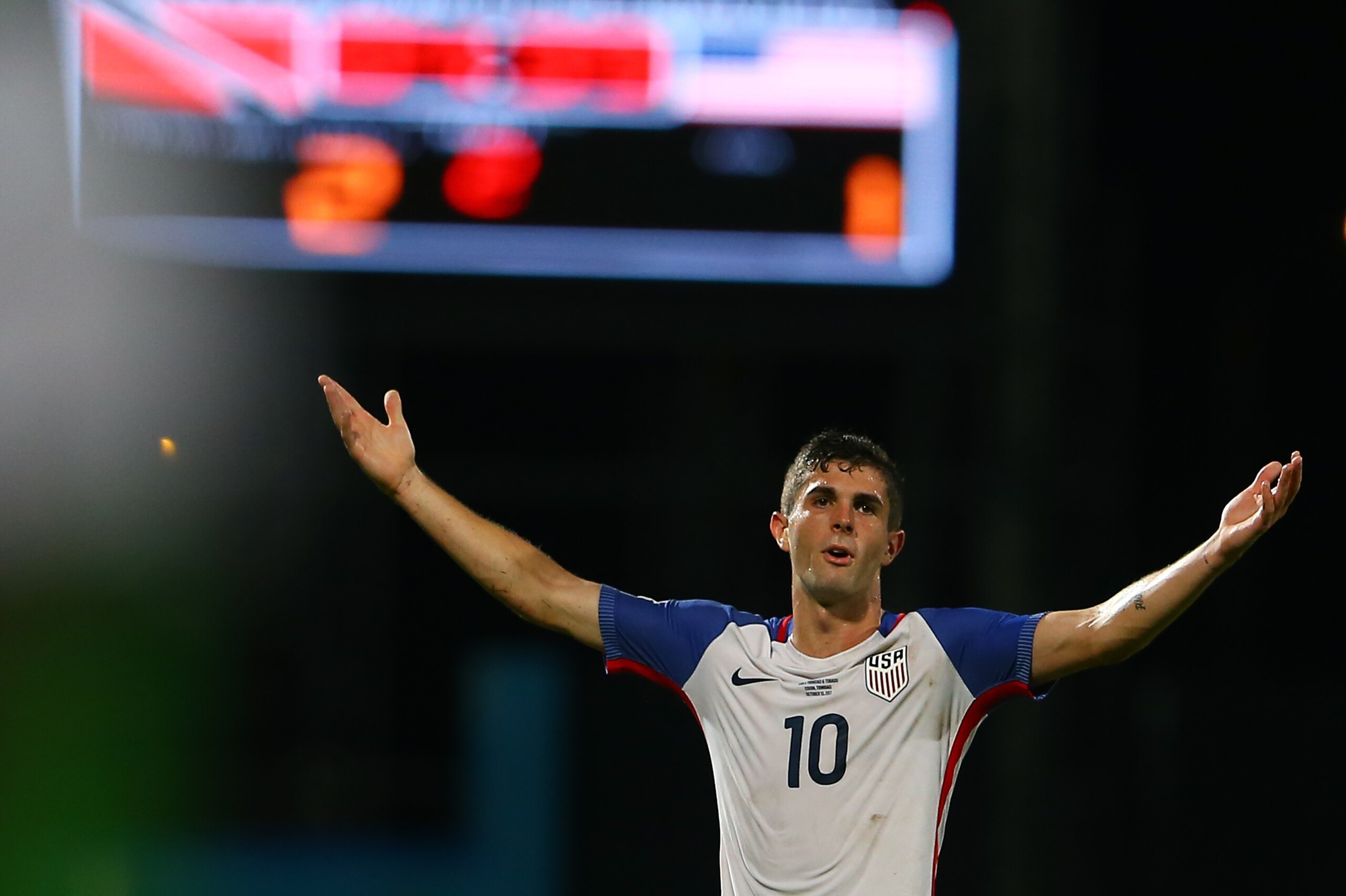 COUVA, TRINIDAD AND TOBAGO - OCTOBER 10: Christian Pulisic of the United States mens national team reacts to the referee's call during the FIFA World Cup Qualifier match between Trinidad and Tobago at the Ato Boldon Stadium on October 10, 2017 in Couva, T